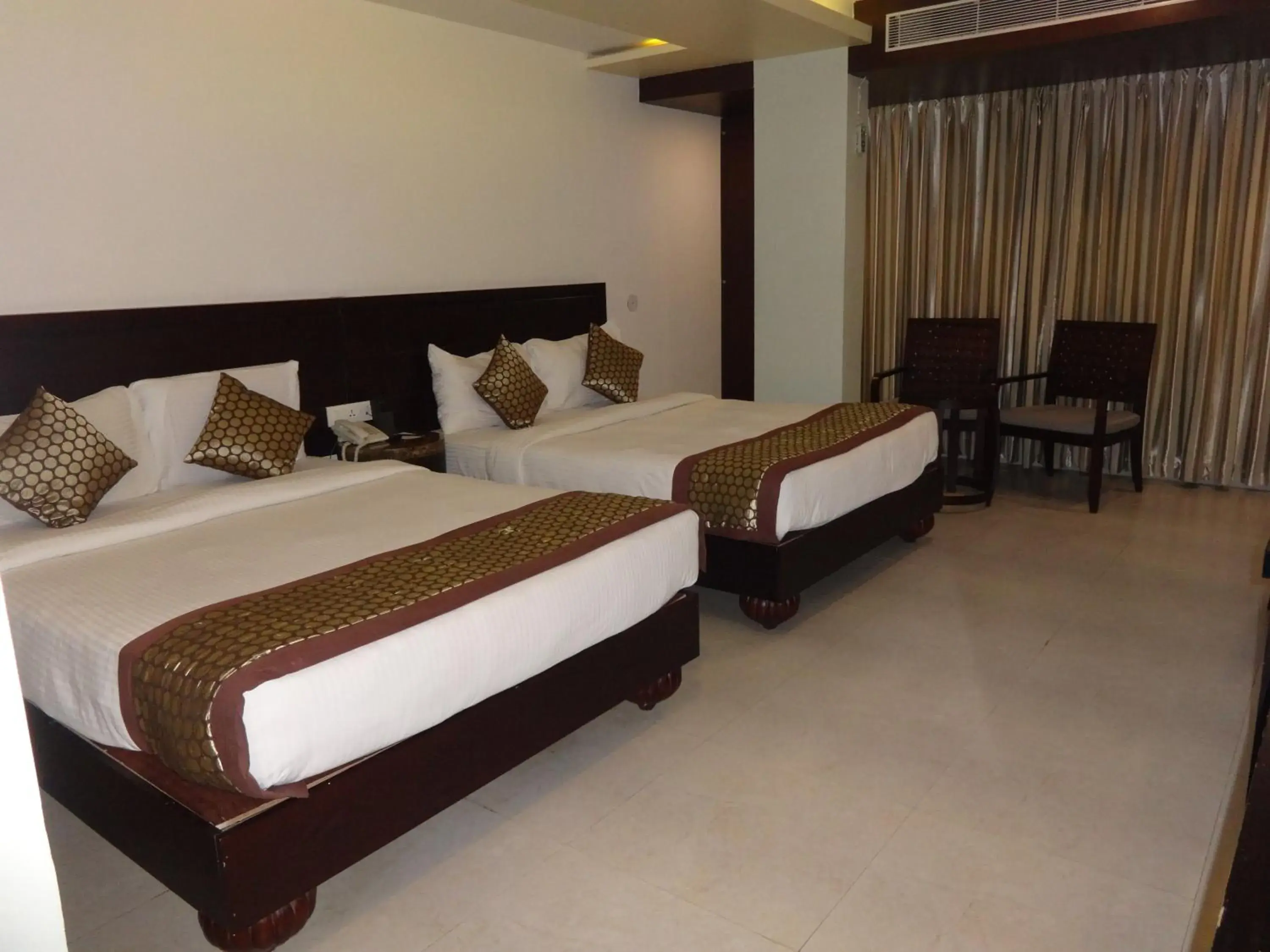 Bed in Pride Ananya Resort Puri
