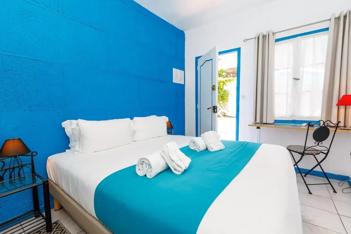 Bed in Hôtel Les Liserons de Mougins Bed in Hôtel Les Liserons de Mougins