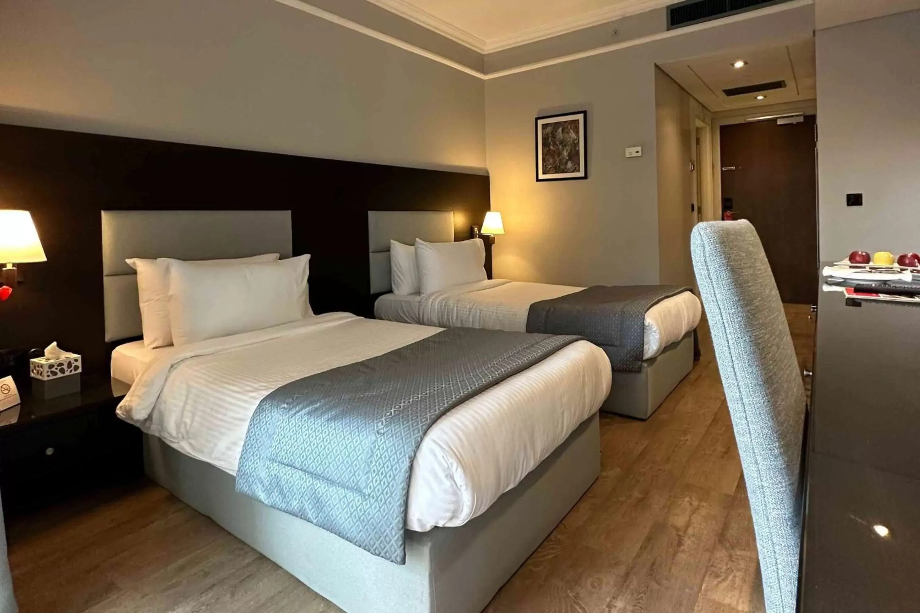 Photo of the whole room, Bed in Ramada by Wyndham Downtown Beirut Photo of the whole room, Bed in Ramada by Wyndham Downtown Beirut