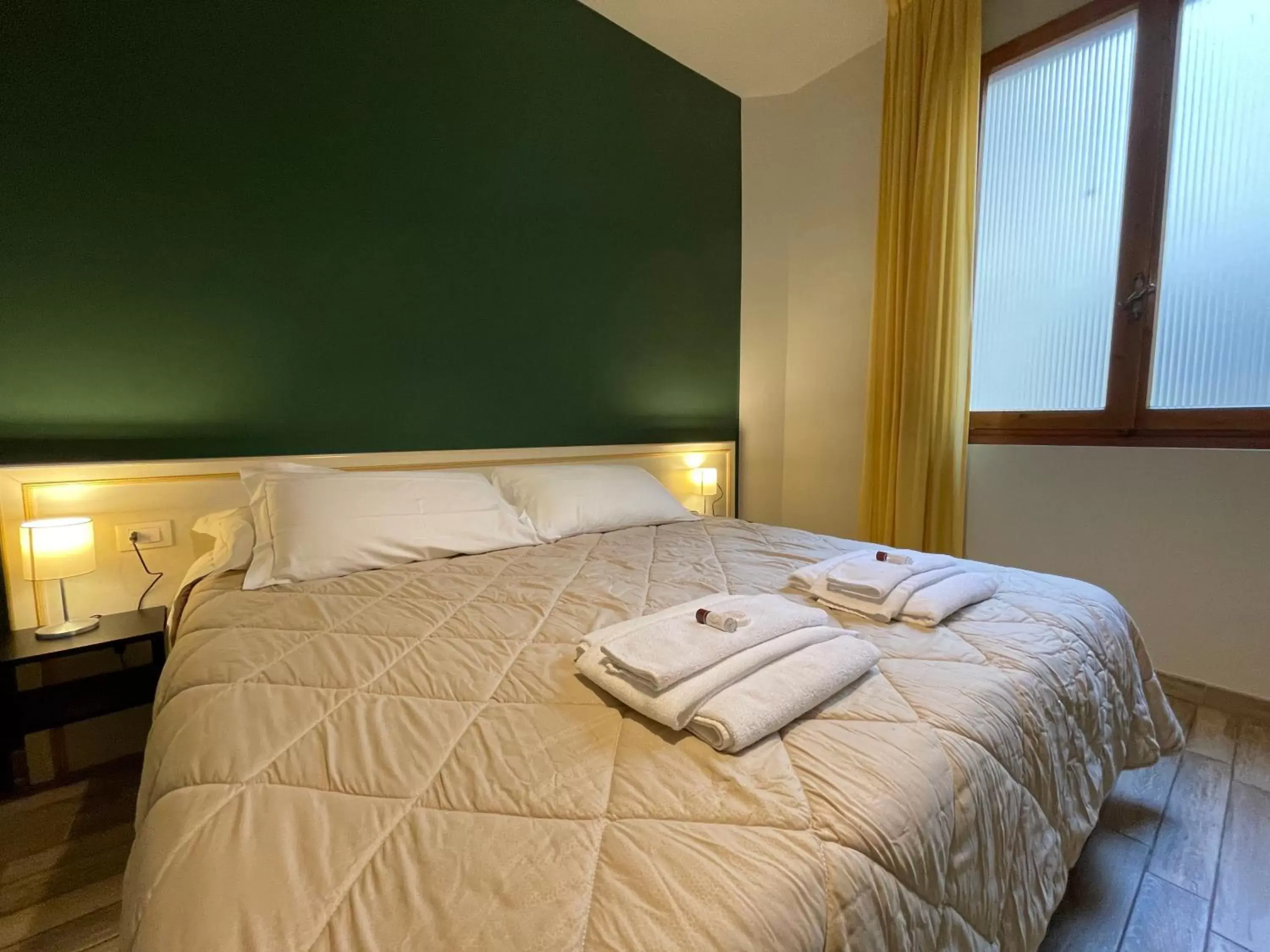 Bed in Hotel Azzi
