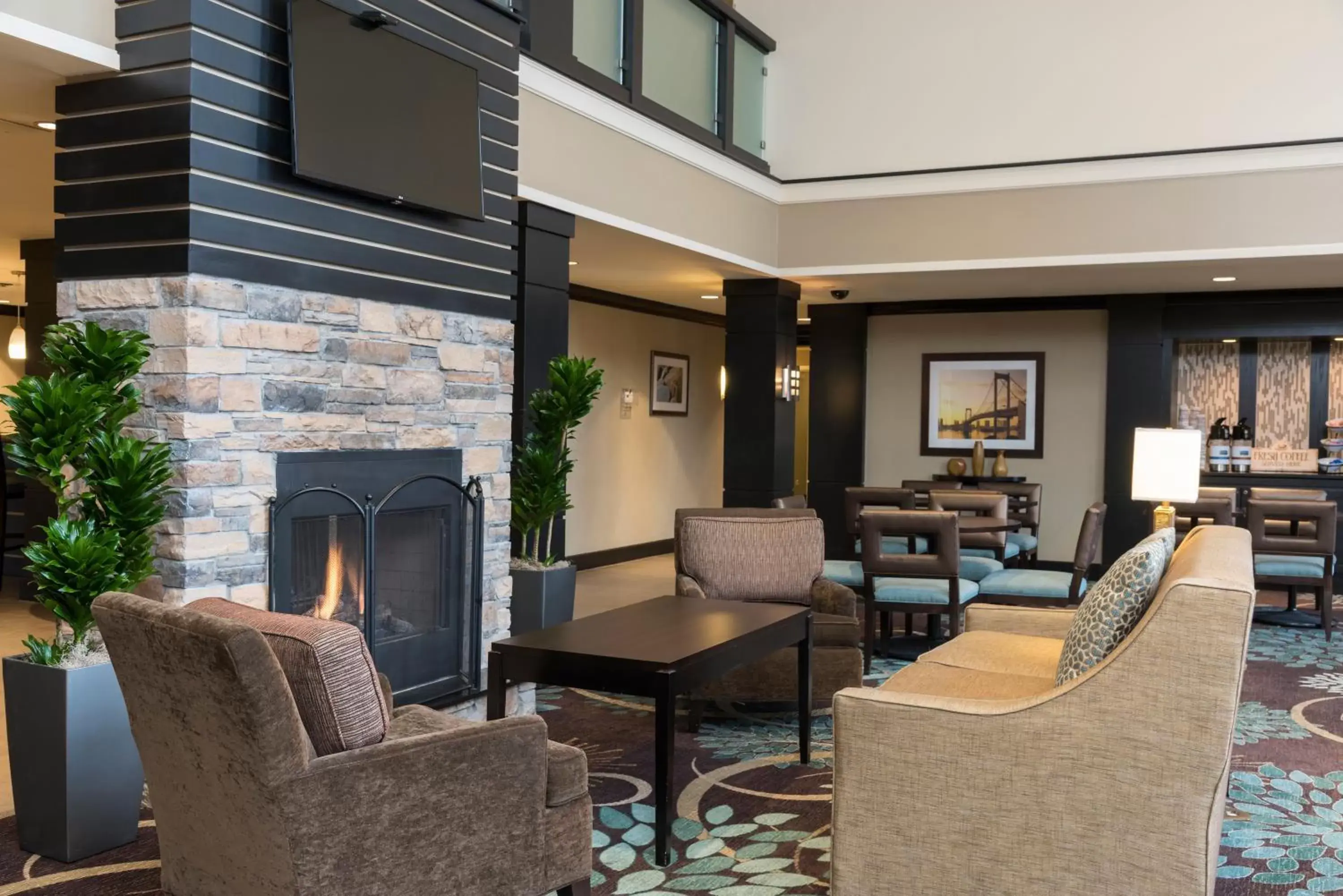 Lobby or reception, Seating Area in Staybridge Suites Chicago-Oakbrook Terrace, an IHG Hotel