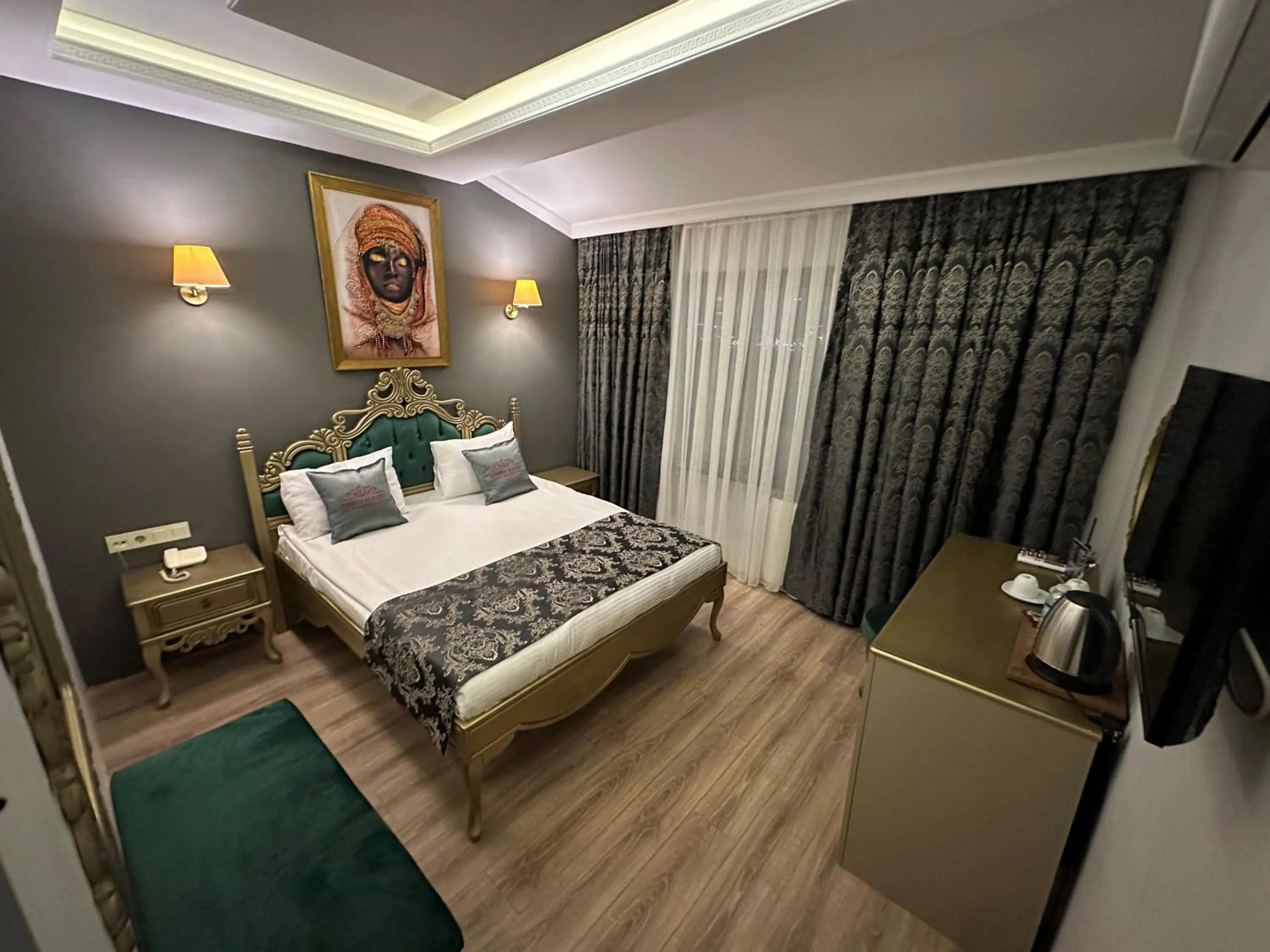Bed in Ethnica Suites