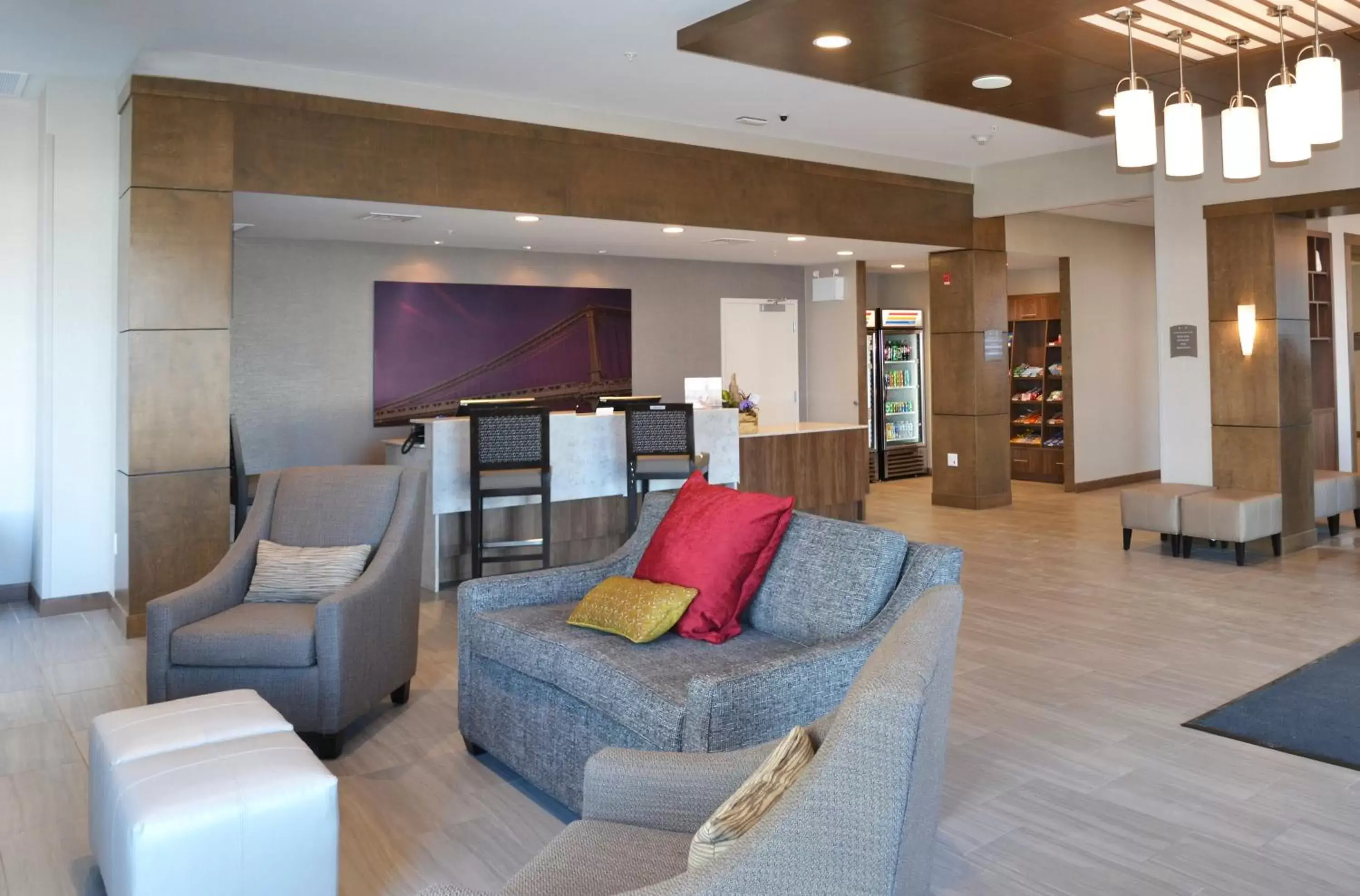 Lobby or reception, Seating Area in Staybridge Suites - Red Deer North, an IHG Hotel