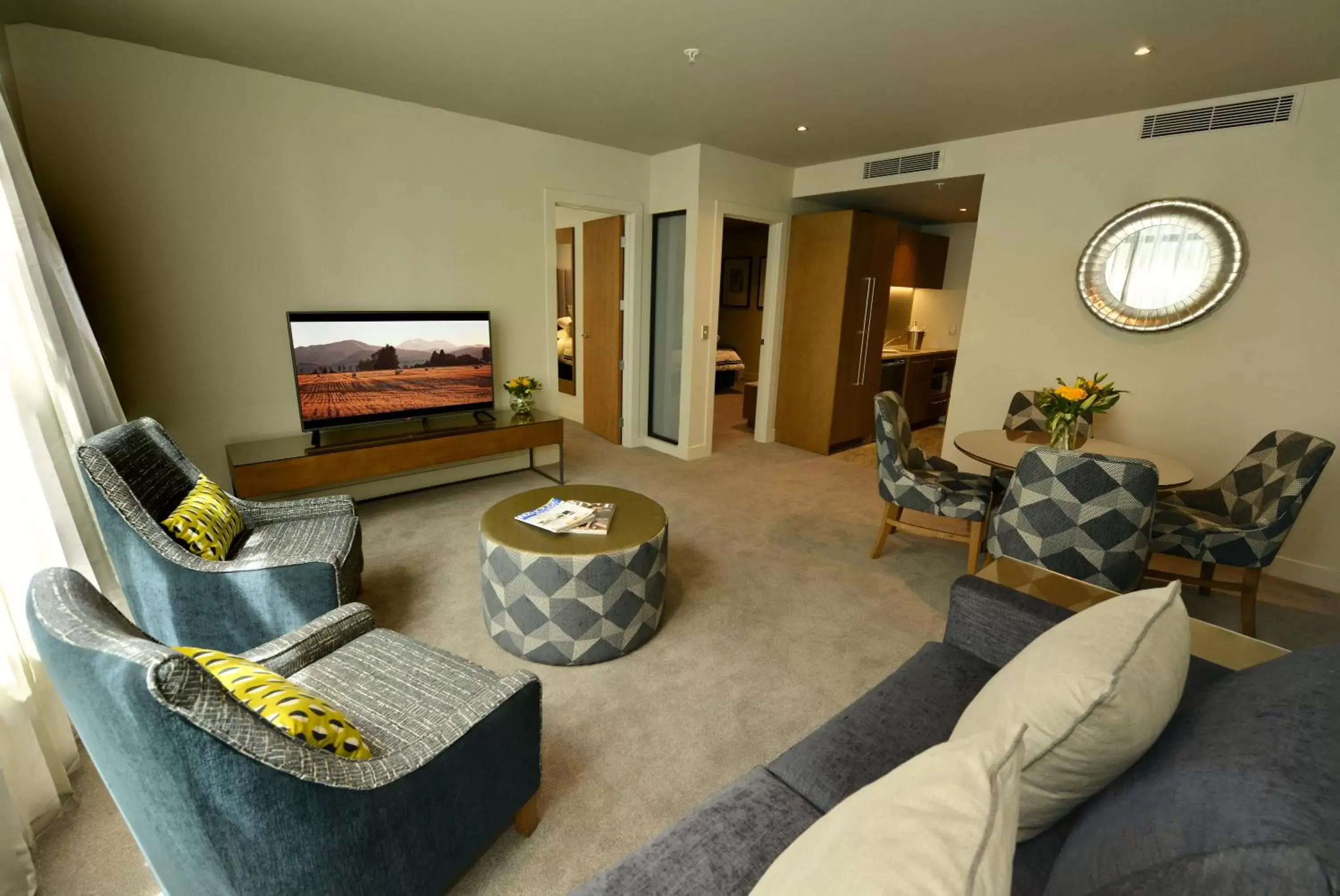 Bedroom, Seating Area in Distinction Dunedin Hotel