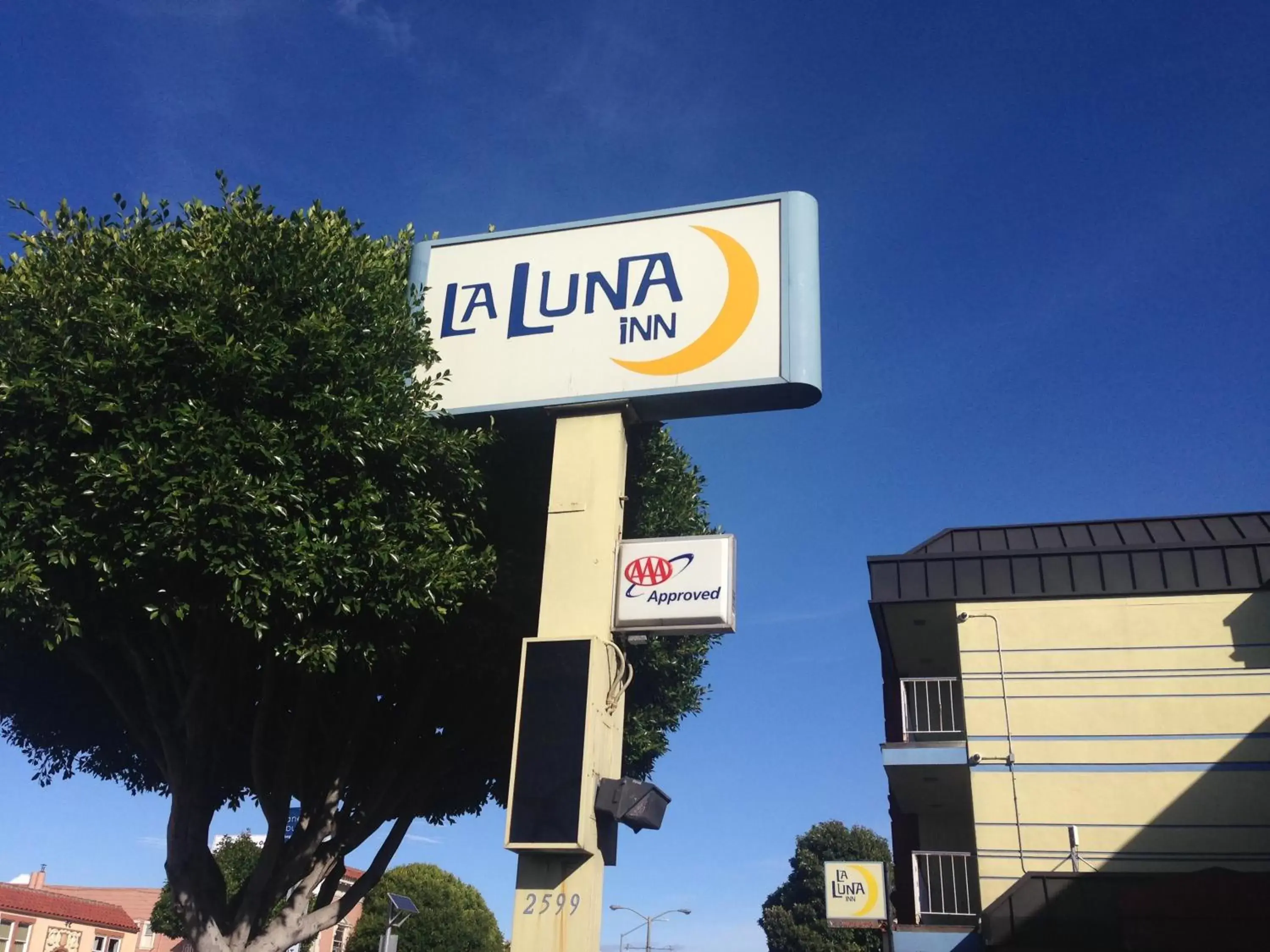 Property logo or sign in La Luna Inn