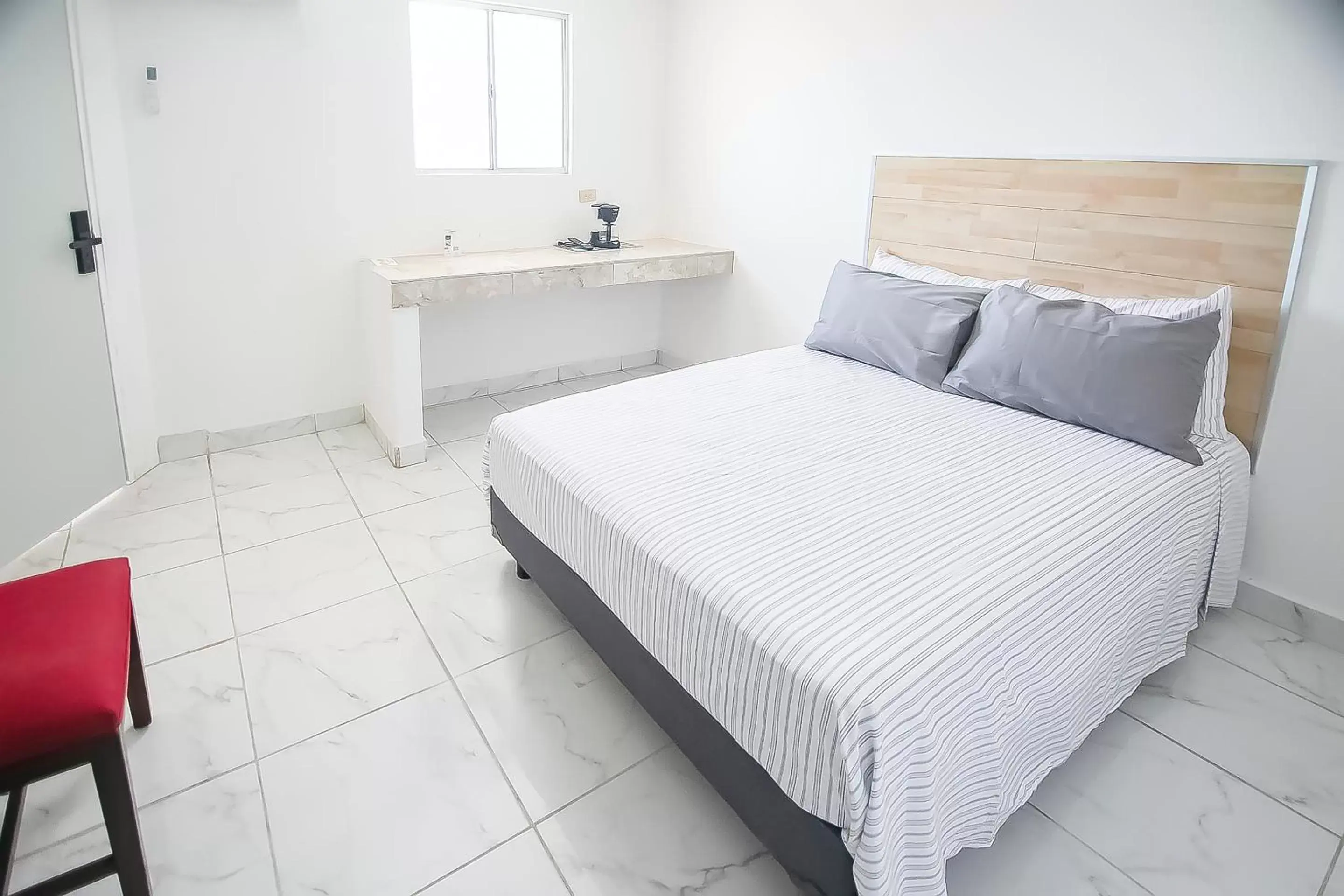 Bedroom, Bed in OYO Hotel Plaza Las Torres, Cabo San Lucas