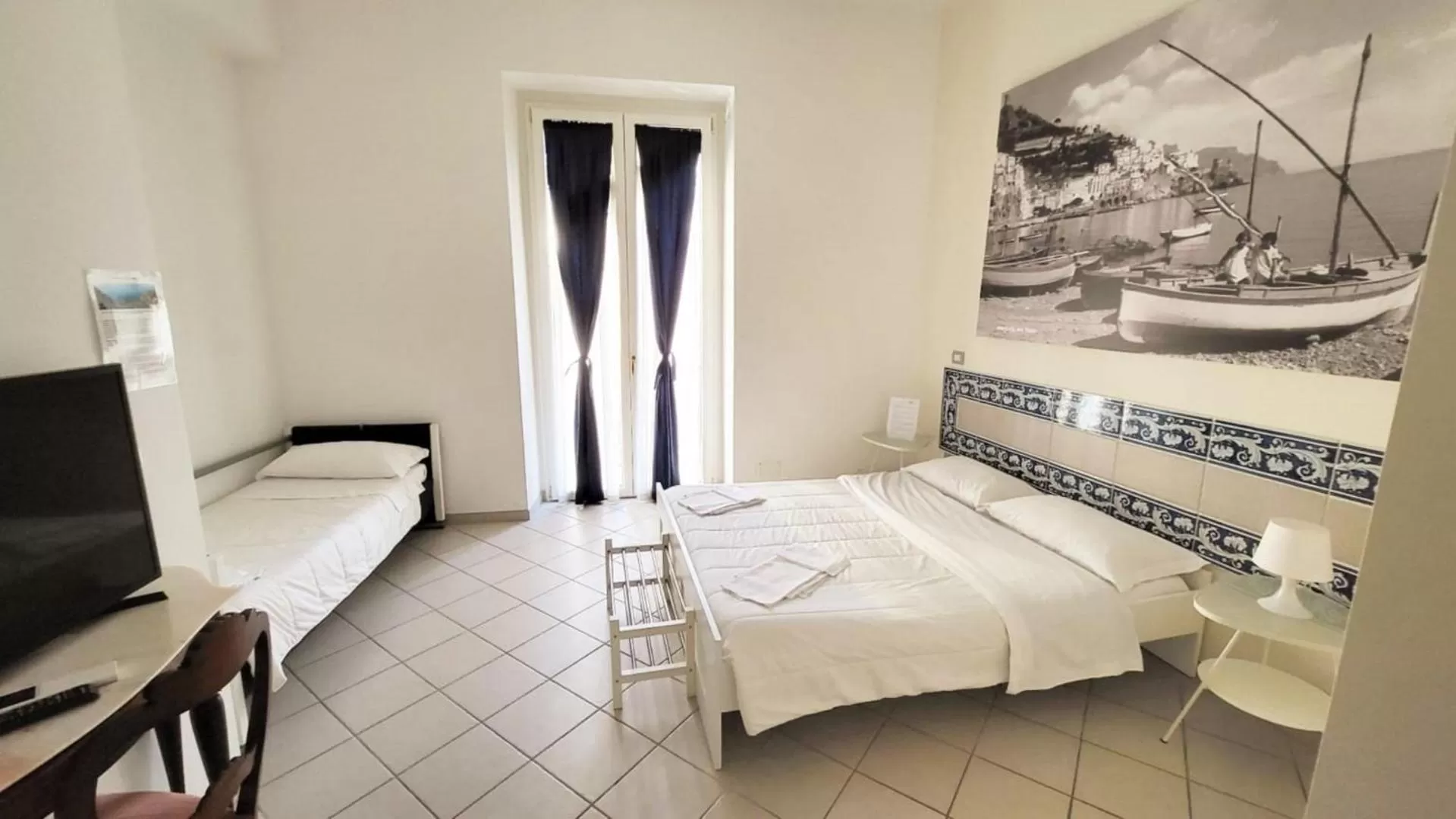 Photo of the whole room, Bed in Santi e Saraceni Rooms