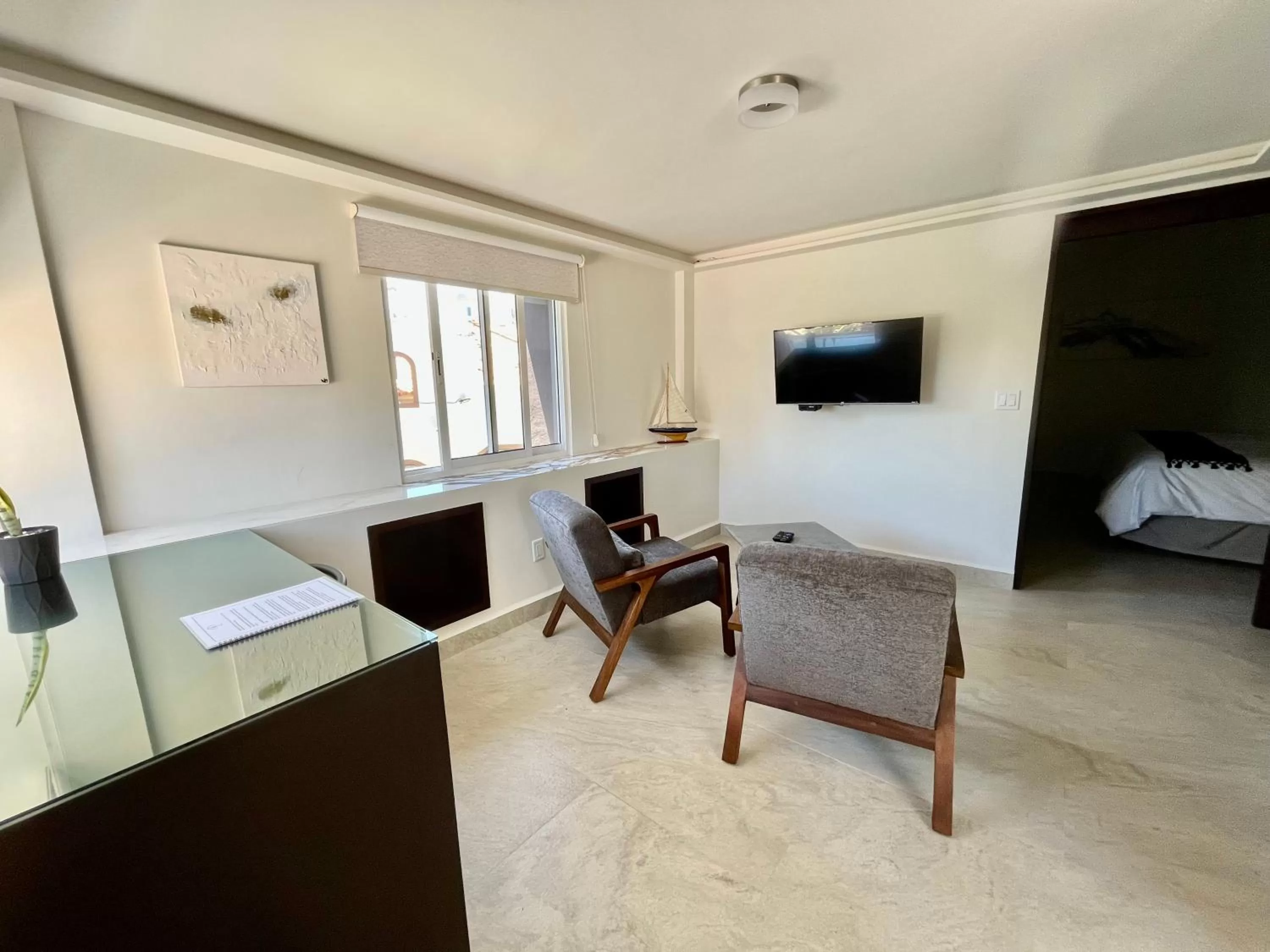 Seating area, TV/Entertainment Center in Marisol Hotel Boutique