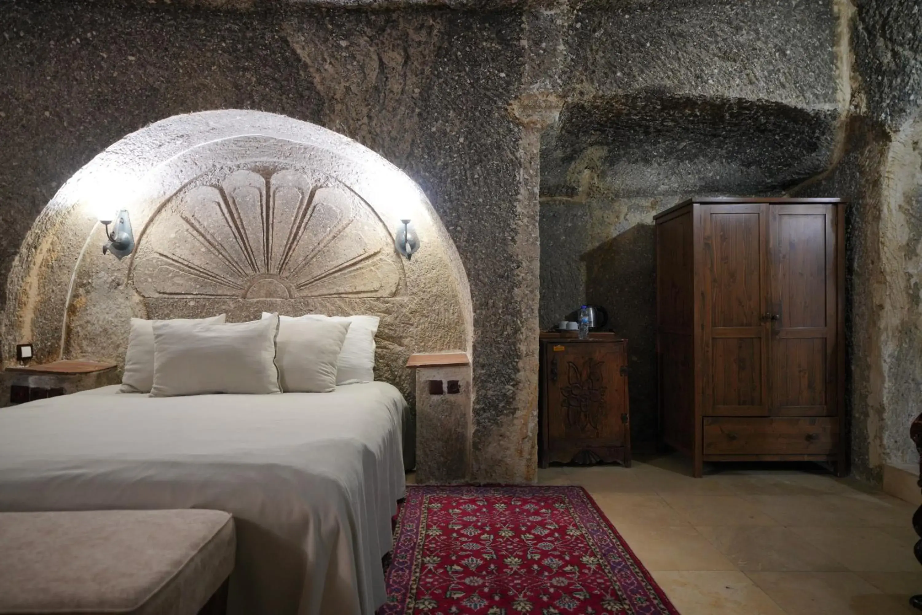 Bed in Holiday Cave Hotel