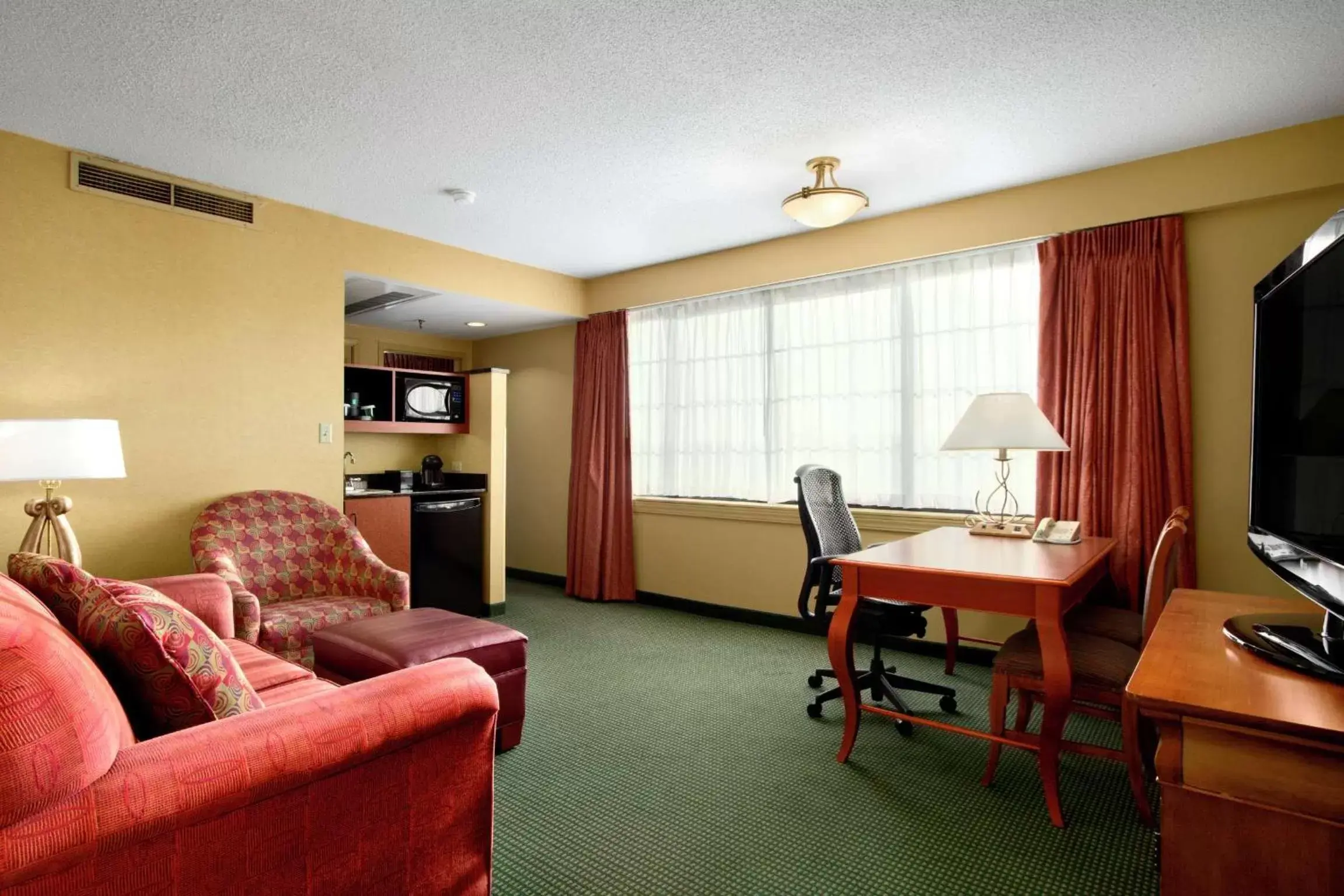 Living room, Seating Area in Embassy Suites by Hilton Greensboro Airport