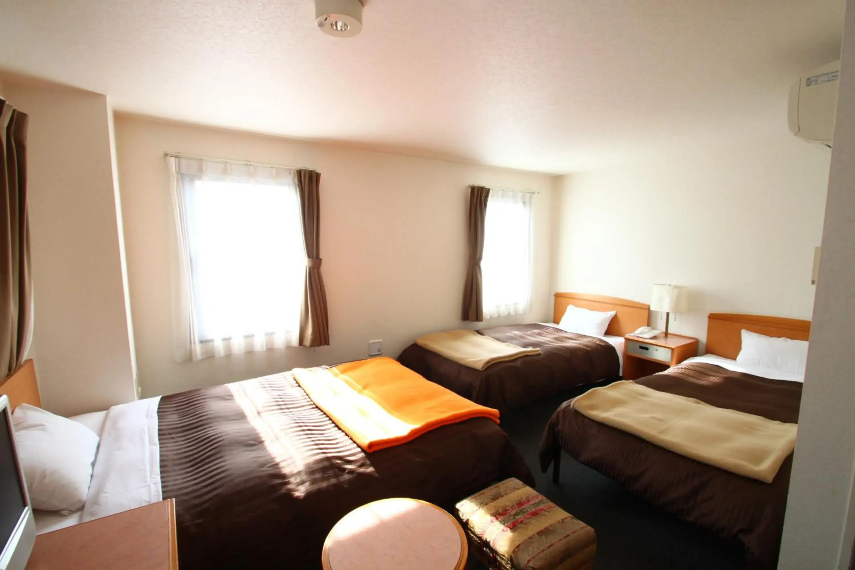 Bed in Sakura Hotel Hatagaya
