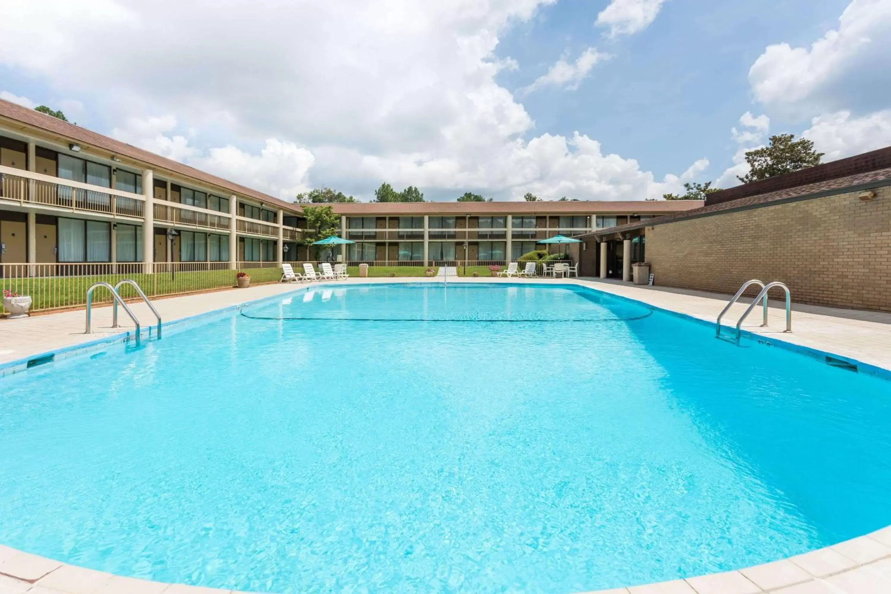 On site, Swimming Pool in Days Inn & Conf Center by Wyndham Southern Pines Pinehurst