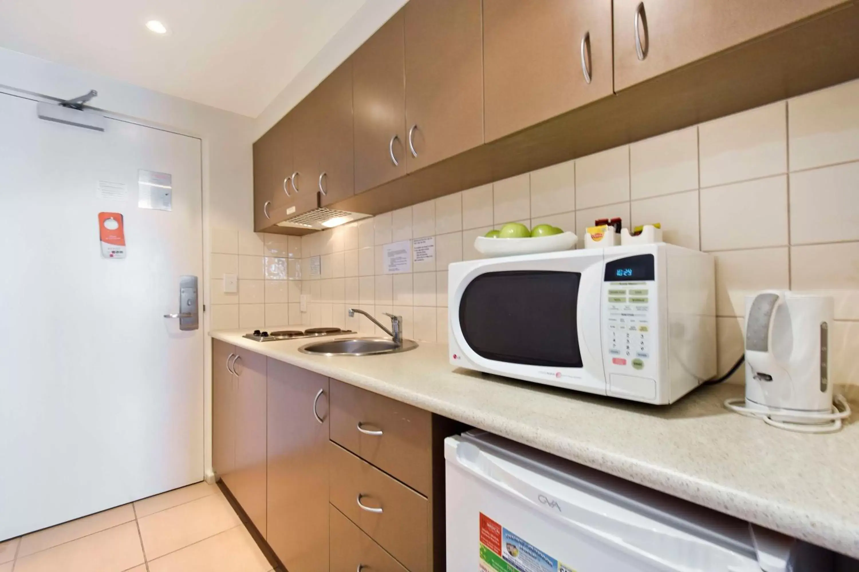 Kitchen or kitchenette, Kitchen/Kitchenette in Metro Advance Apartments & Hotel