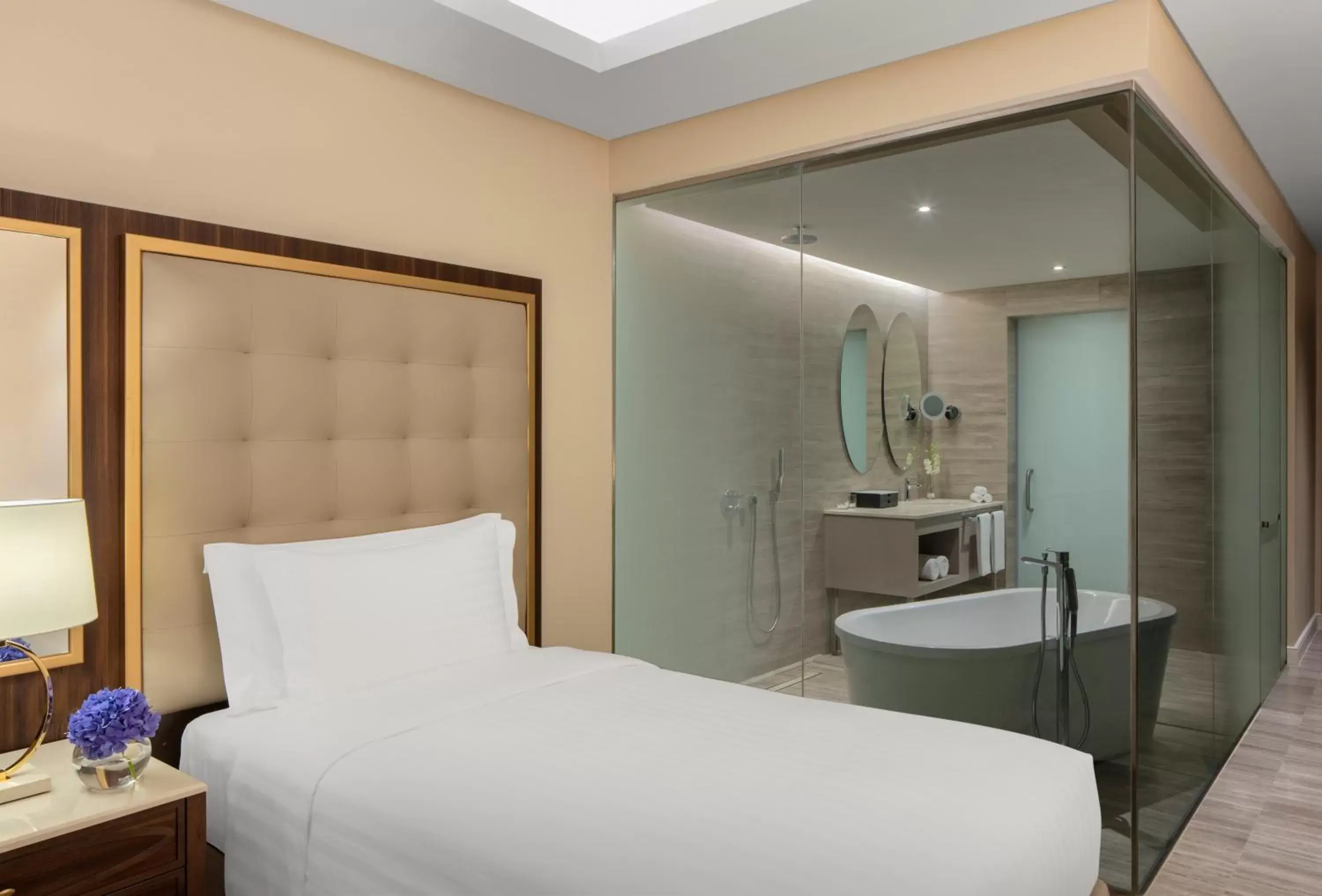 Bed in Dusit Doha Hotel