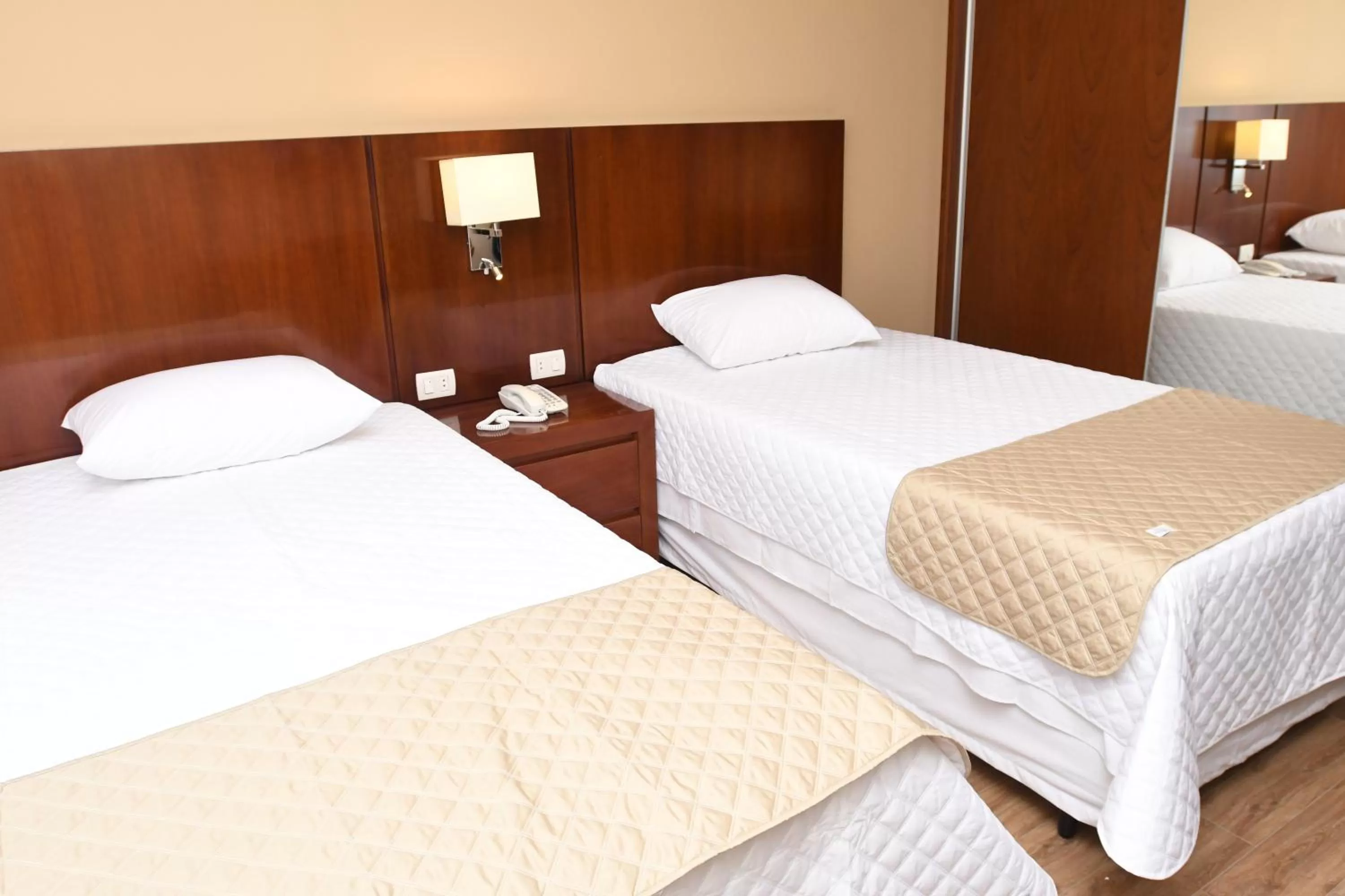 Bed in Taos Apart Hotel