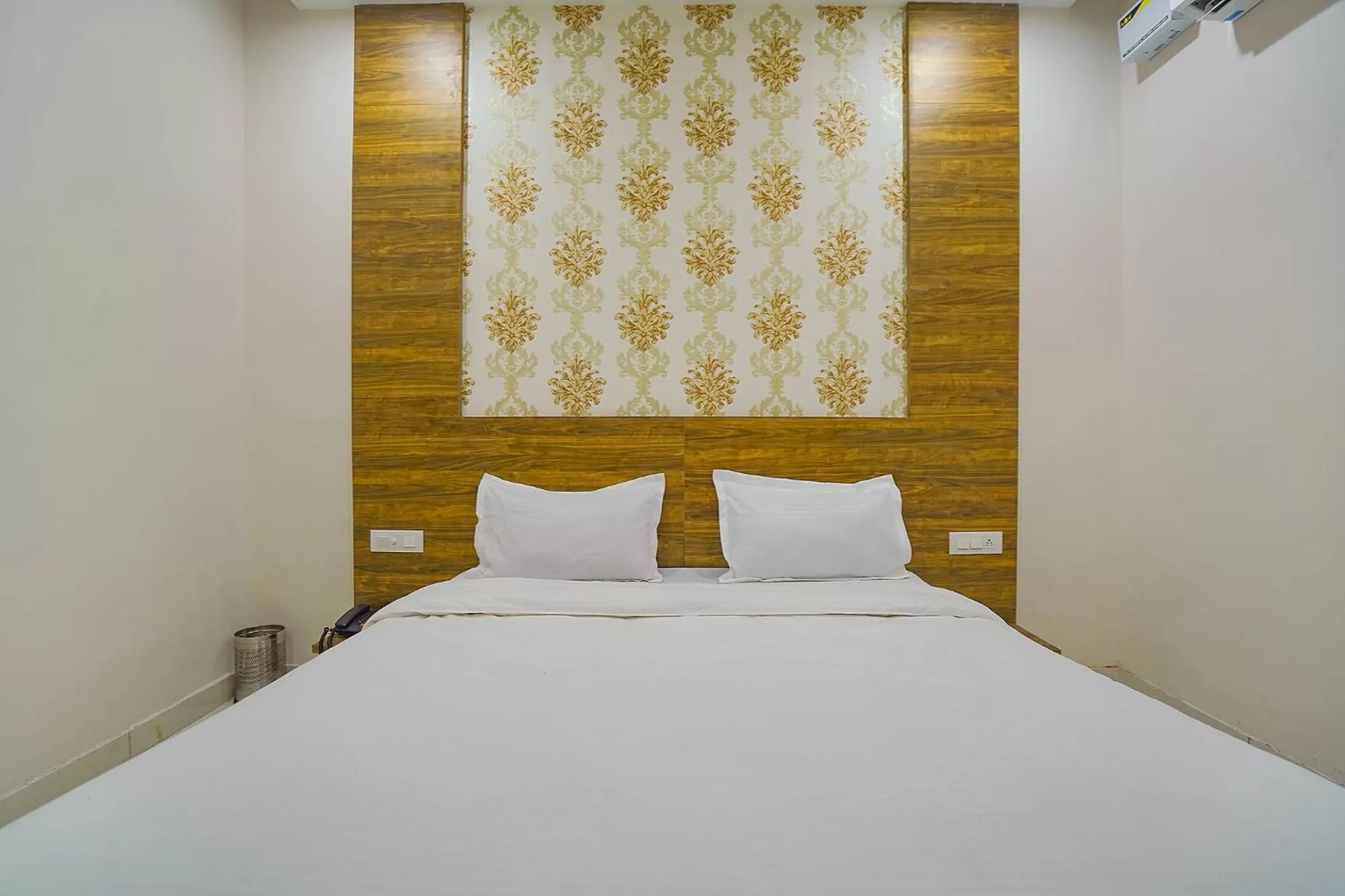 Bed in FabHotel HC Mohali Inn