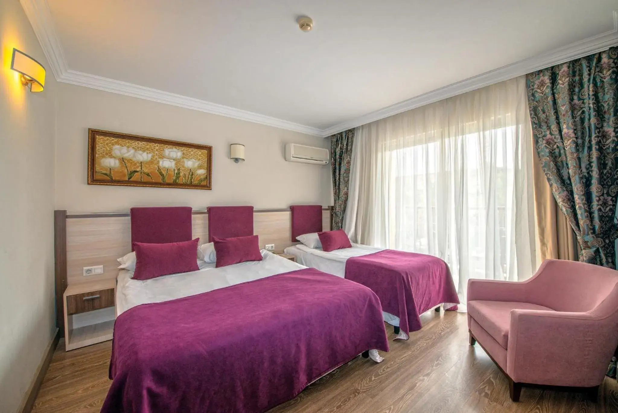 Bedroom, Bed in Crystal Aura Beach Resort & Spa