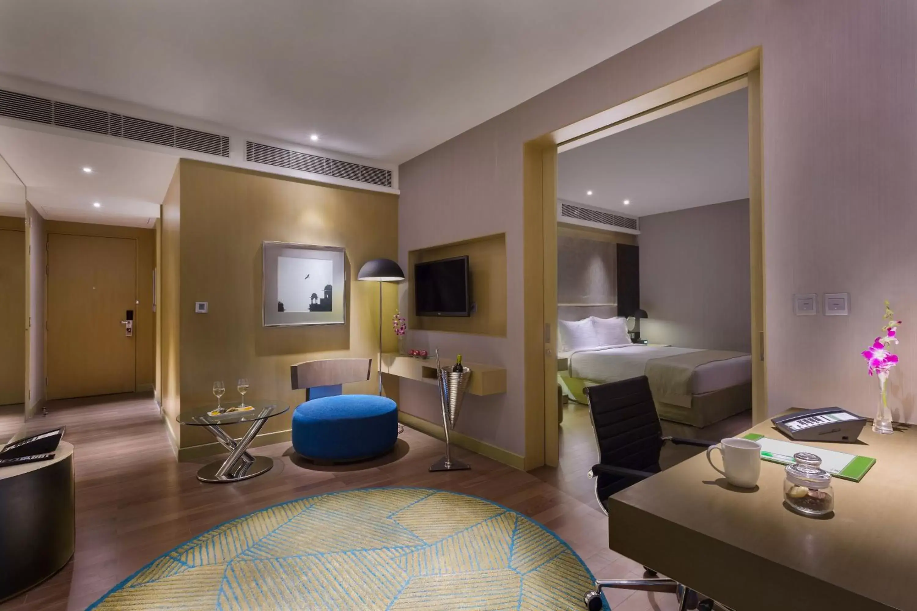 Bedroom, Seating Area in Holiday Inn New Delhi International Airport, an IHG Hotel