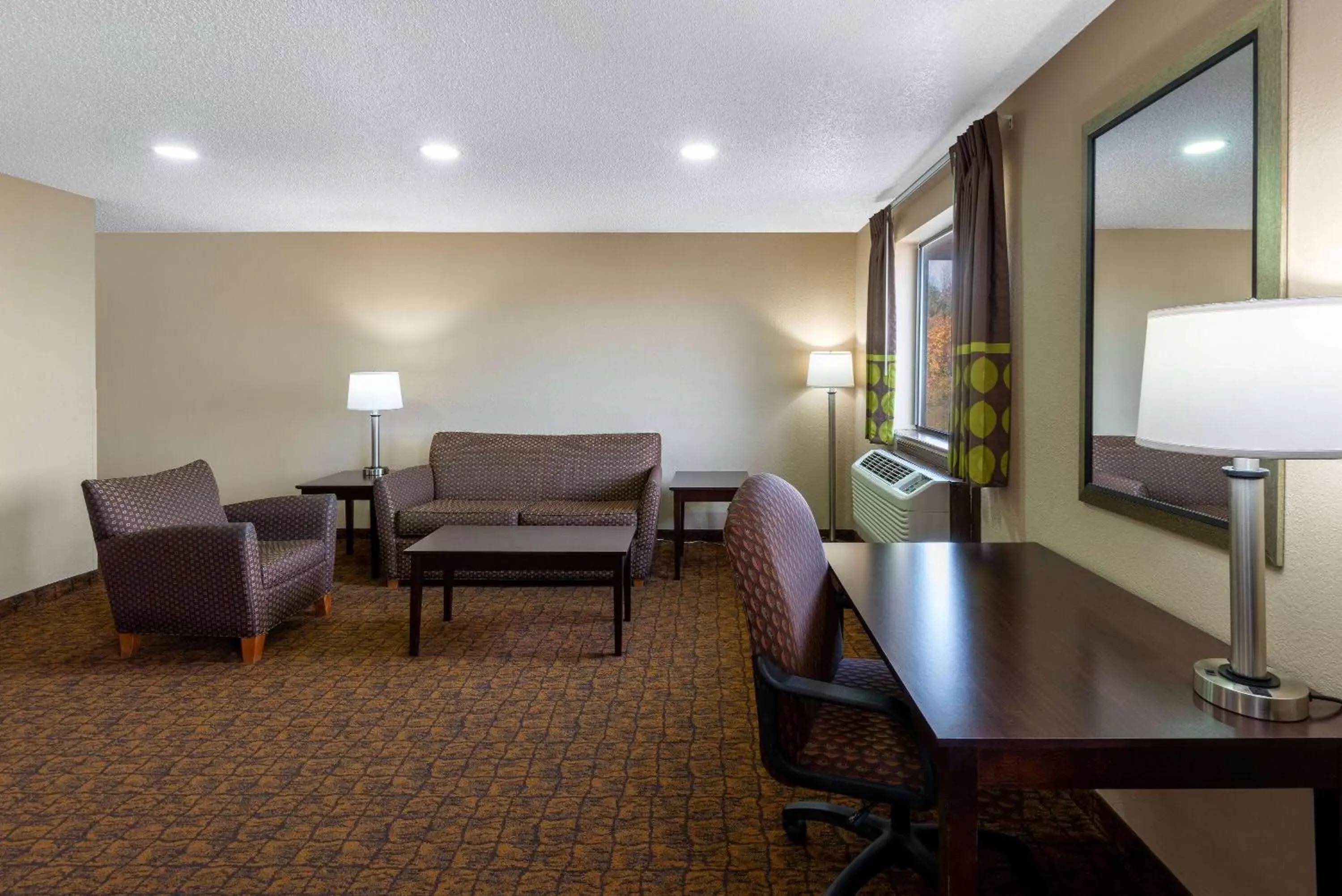 Bed, Seating Area in Super 8 by Wyndham Summersville