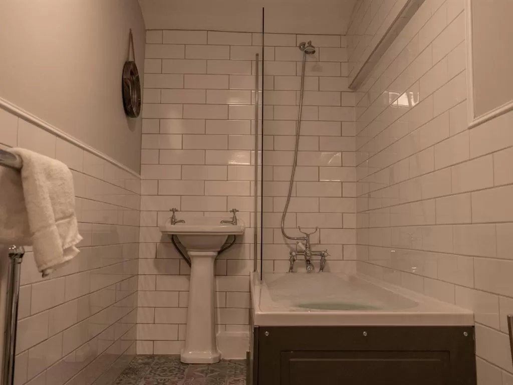 Bathroom in The Lion Pub & Grill