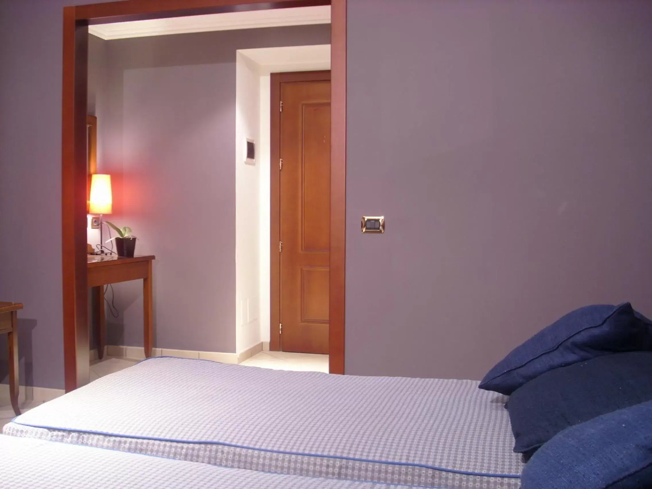 Bed in Hotel Taormina
