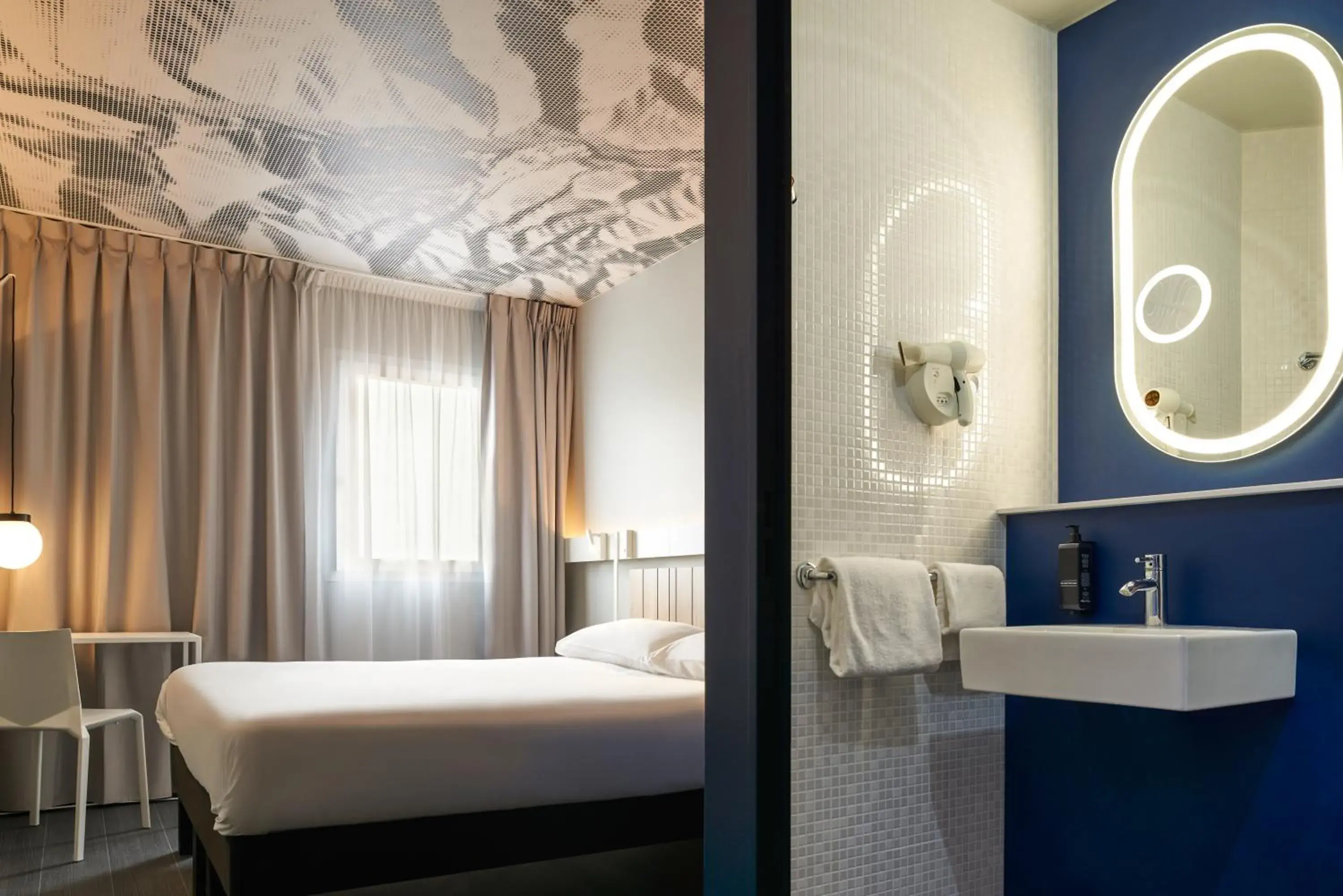 Bed, Bathroom in ibis Paris Nation Davout