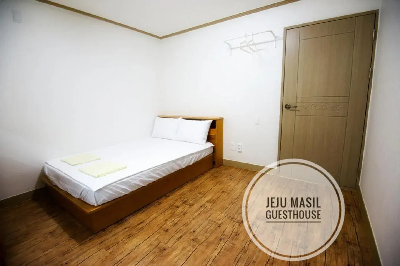 Bed in Masil Guesthouse Jeju