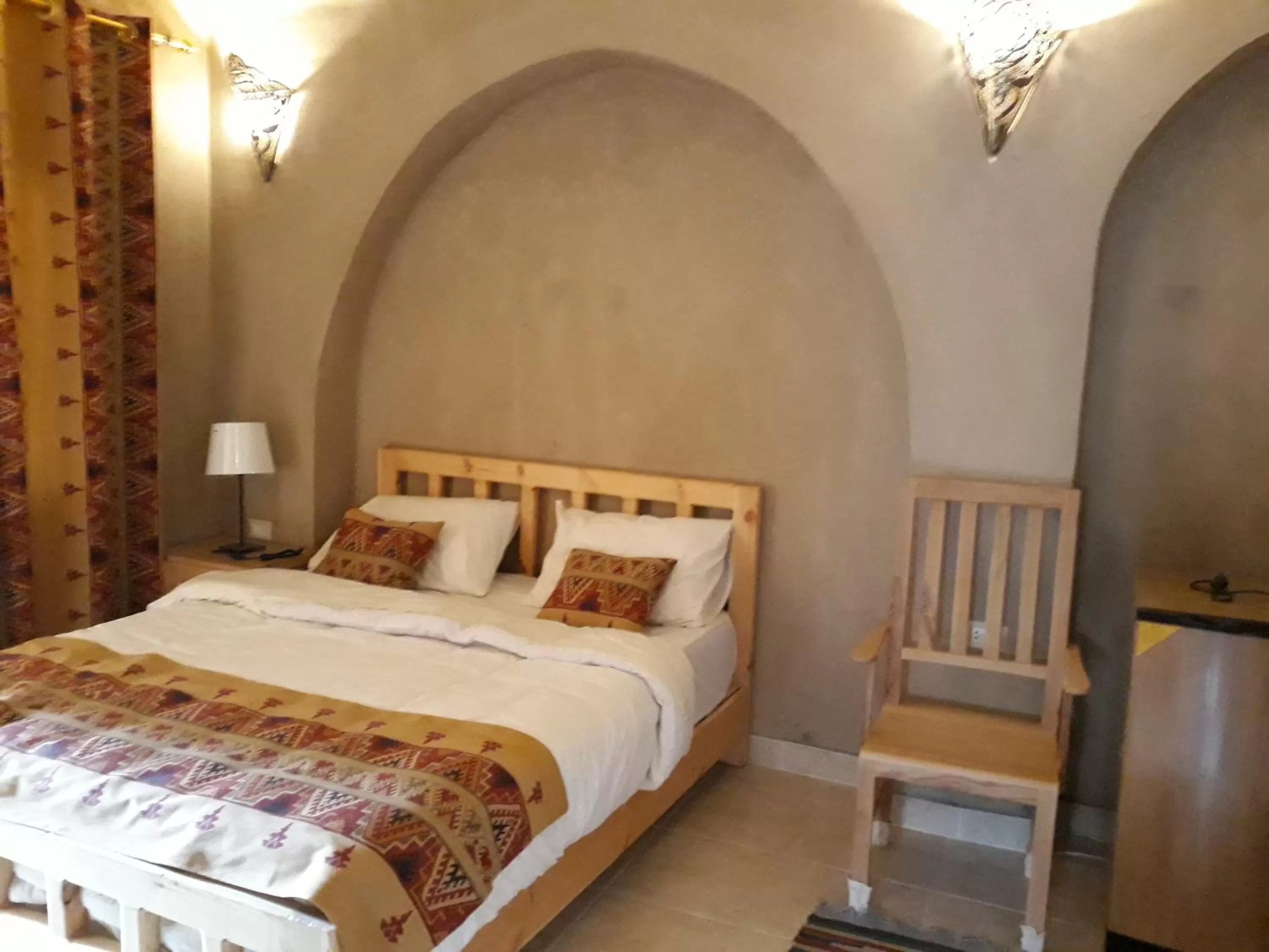 Bed in Embrace Hotel