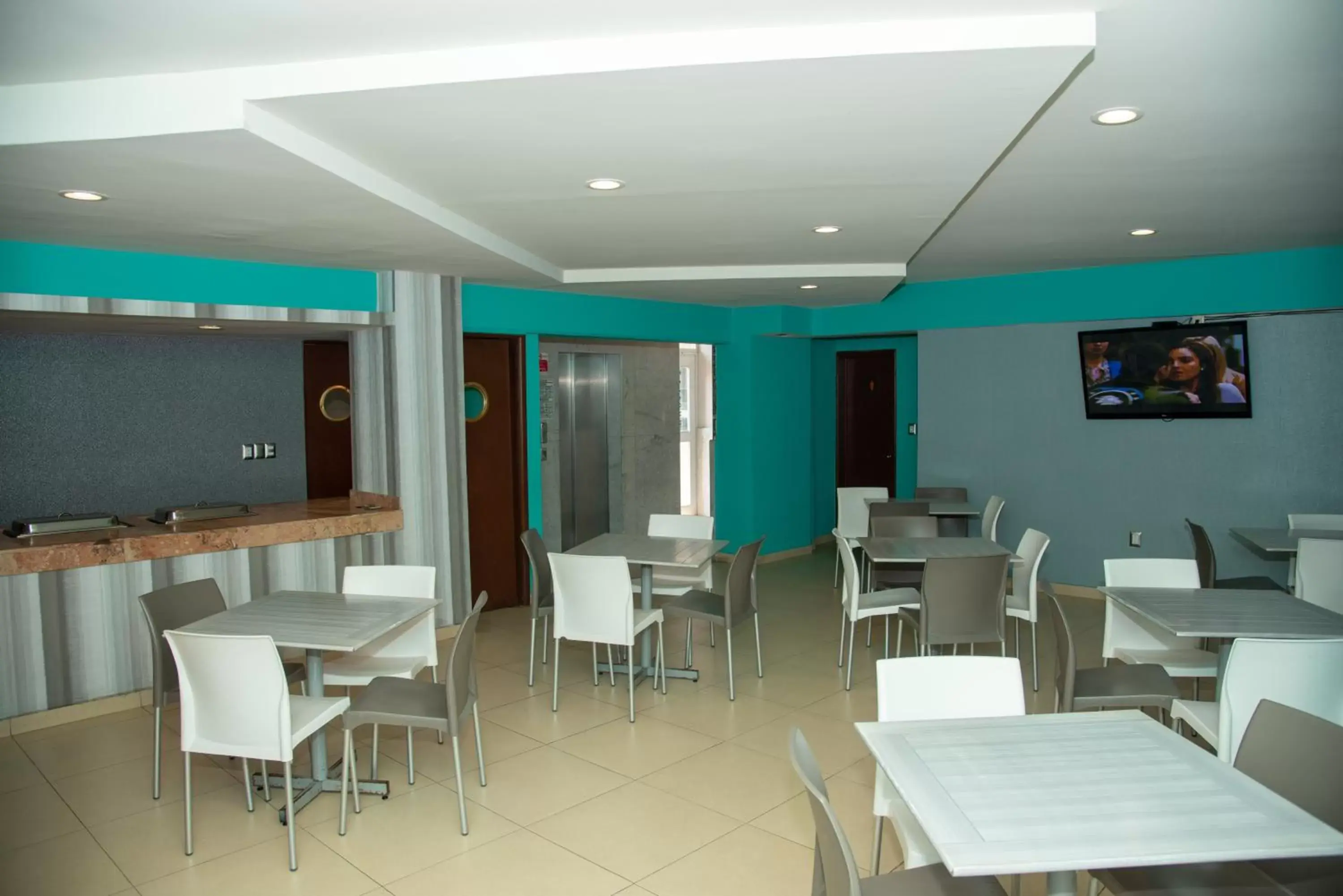 Restaurant/Places to Eat in Hotel Impala Centro