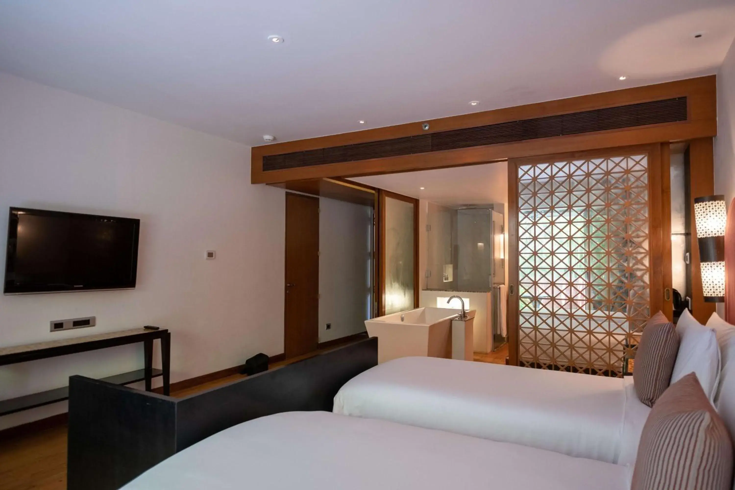 Communal lounge/ TV room, Bed in Alila Diwa Goa - A Hyatt Brand