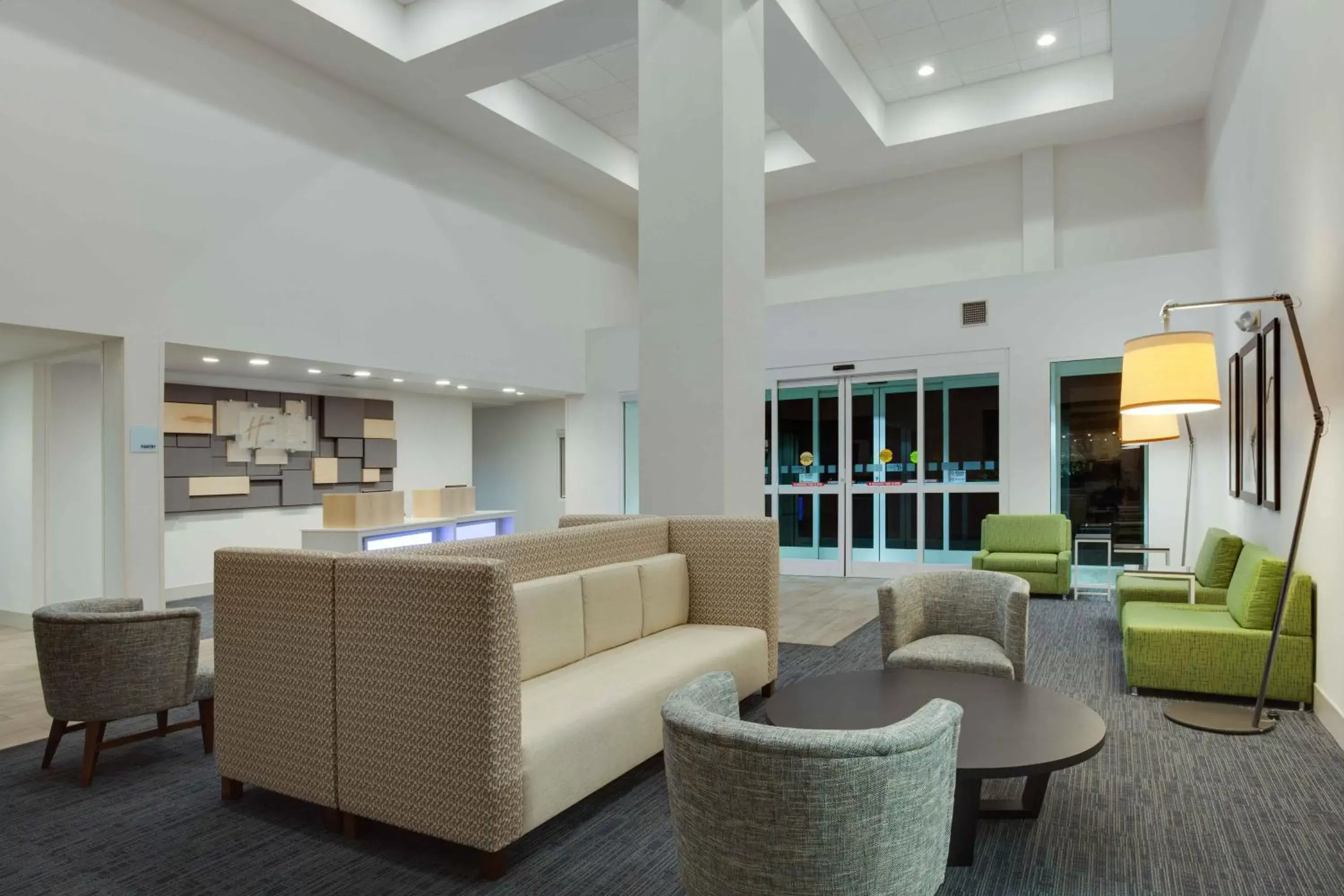 Lobby or reception, Lobby/Reception in Holiday Inn Express & Suites Orlando International Airport, an IHG Hotel
