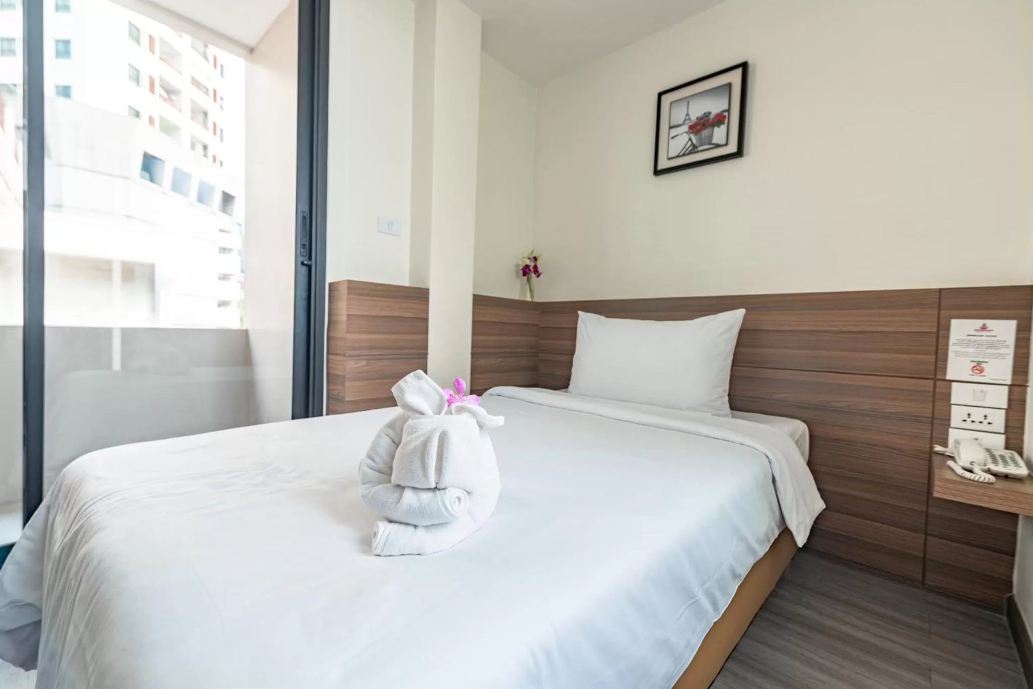 Bed in Sovereign Group Hotel at Pratunam