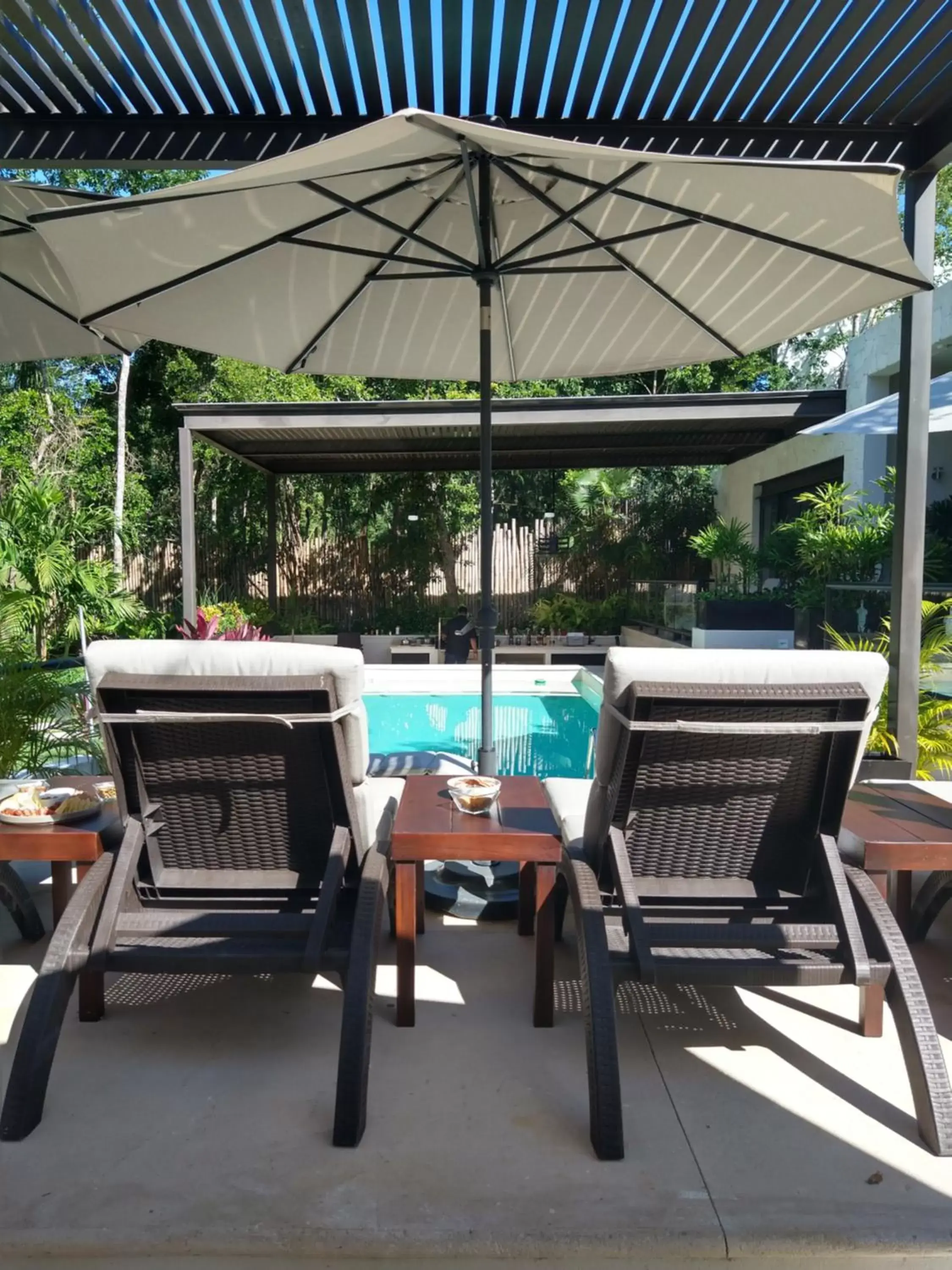 Patio, Swimming Pool in Xaha Villas Suites & Golf Resort