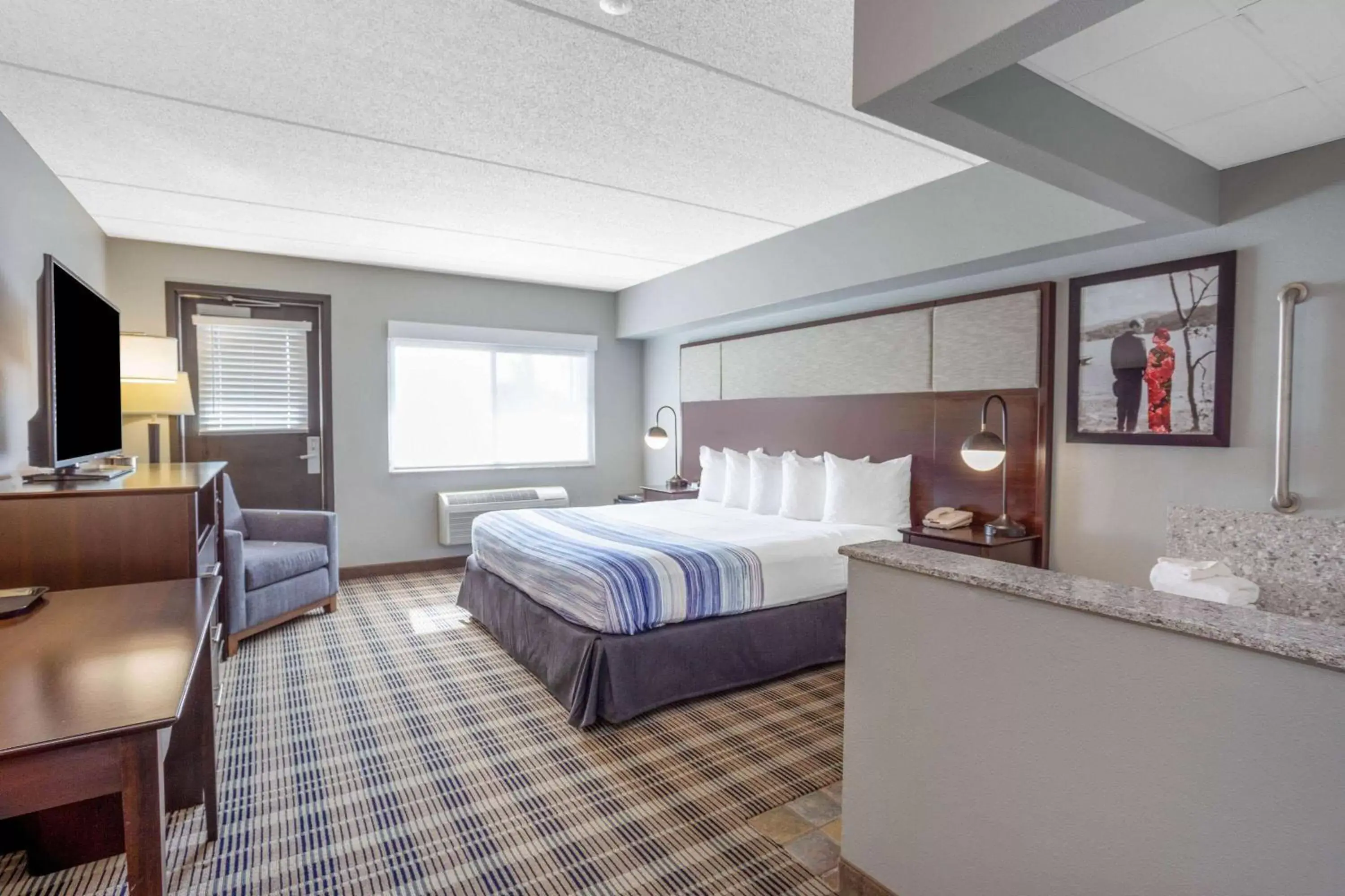 Photo of the whole room, Bed in AmericInn by Wyndham Madison South