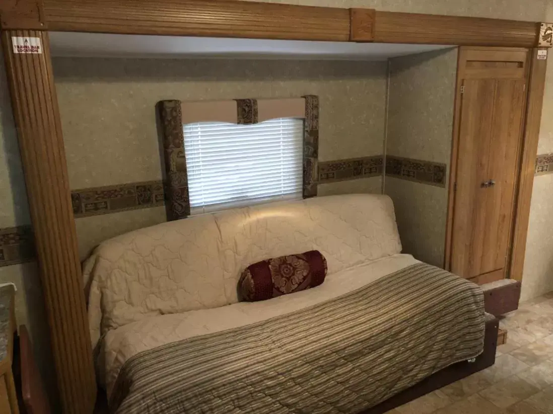 Bed in Cindy’s Motel & RV Park