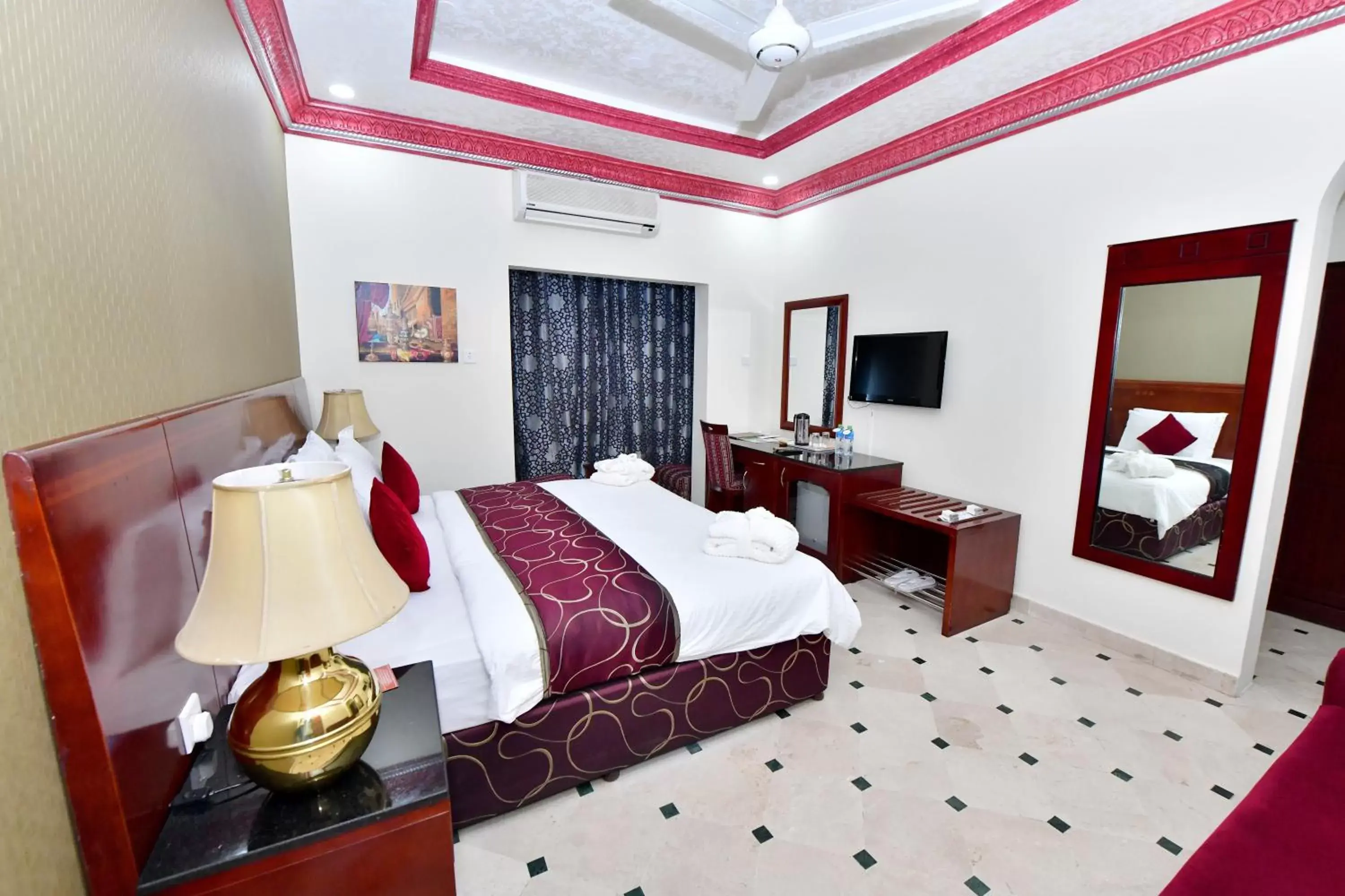 Photo of the whole room, Bed in Al Bahjah Hotel