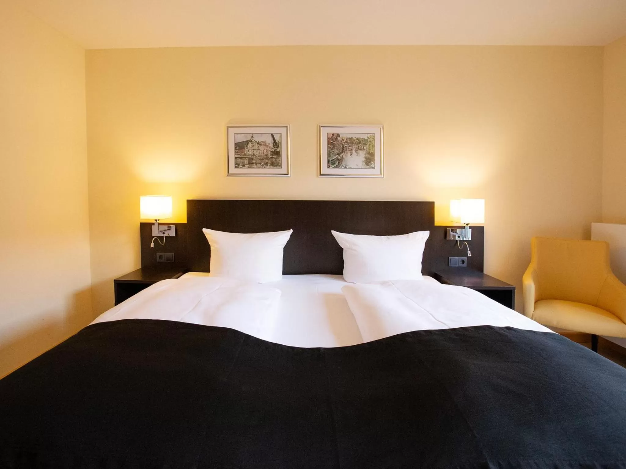 Photo of the whole room, Bed in DORMERO Hotel Altes Kaufhaus Lüneburg