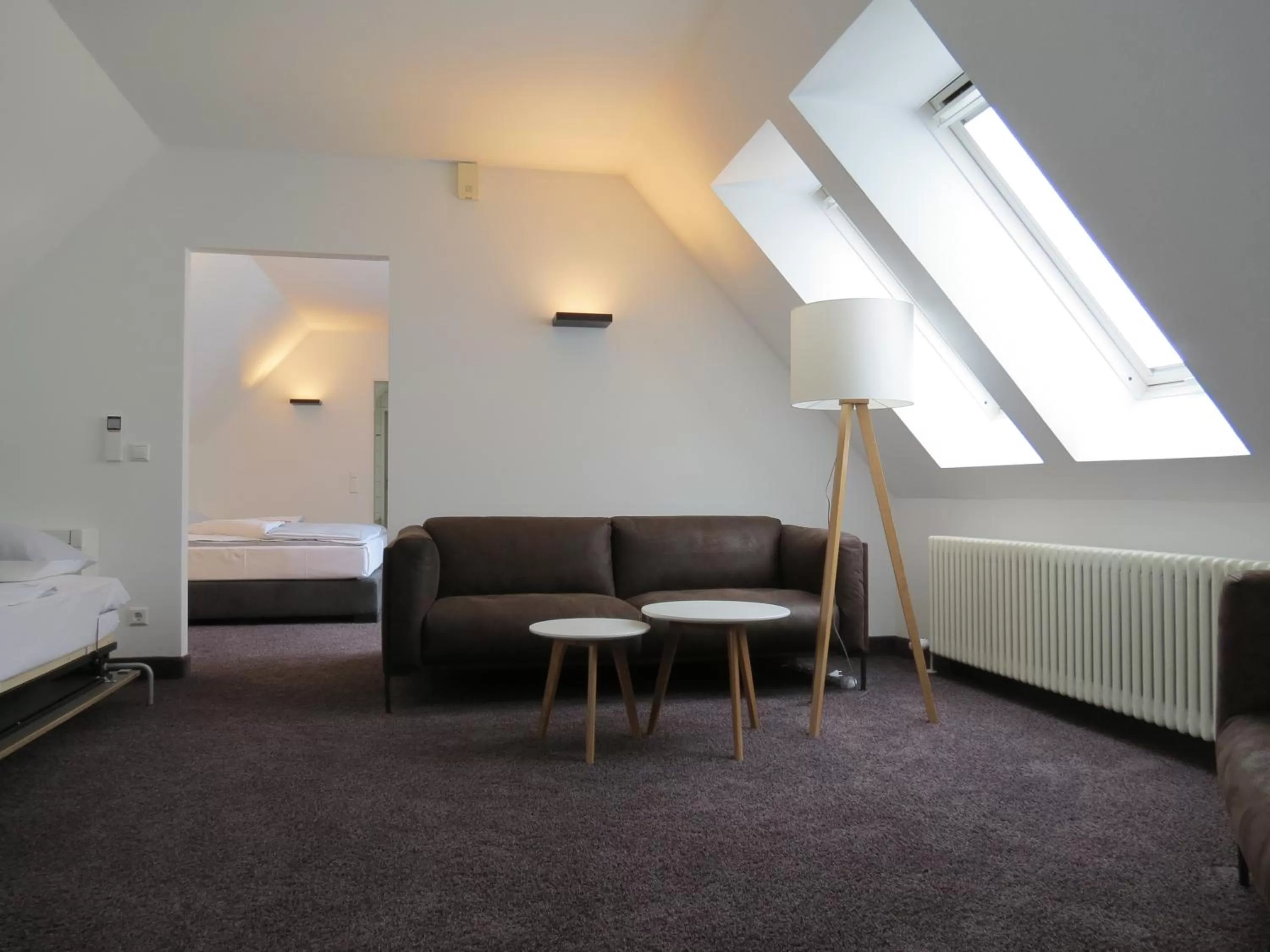 Living room, Bed in Comfor Hotel Ulm City