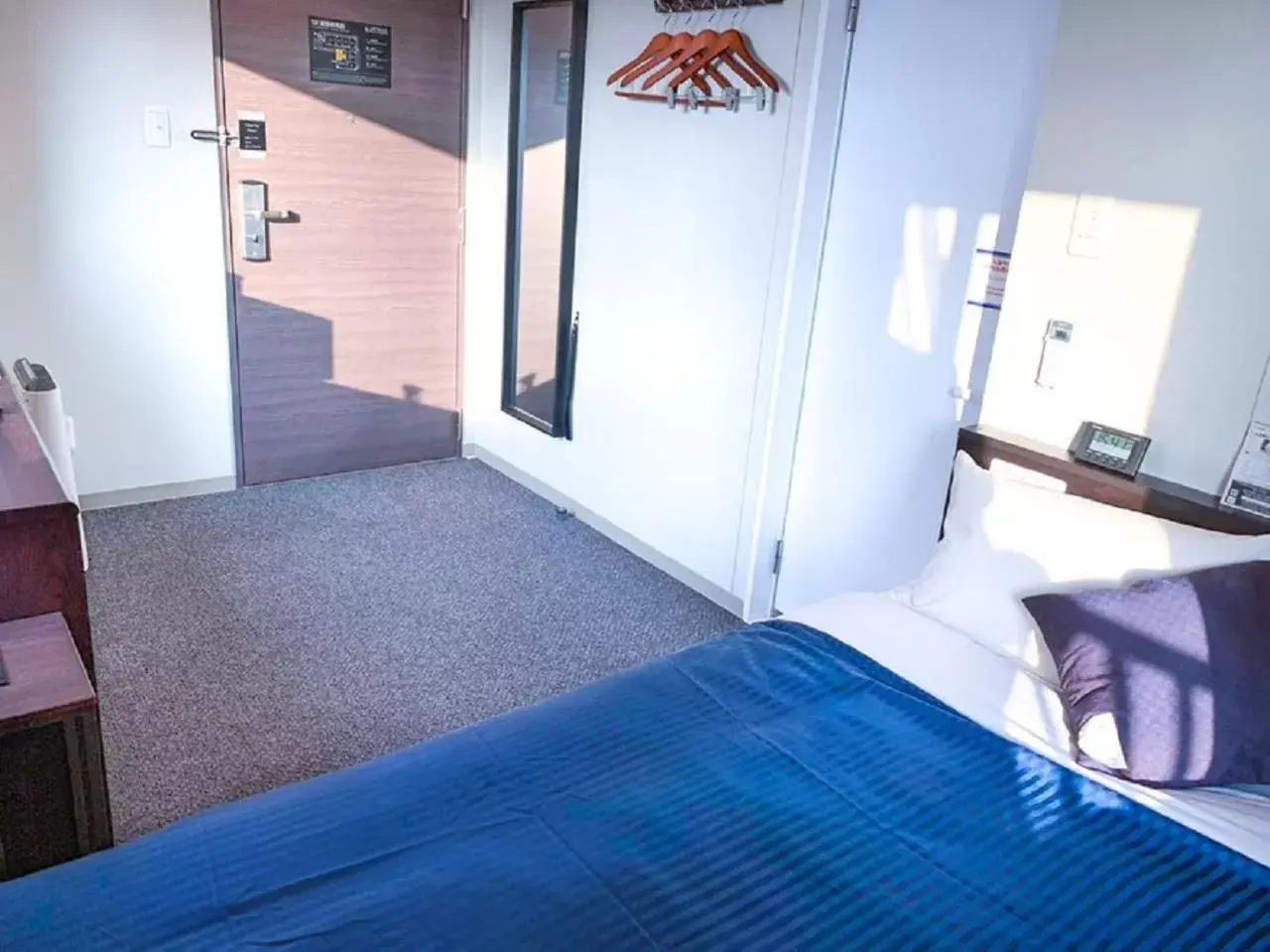 Bed in HOTEL LiVEMAX Umeda WEST Bed in HOTEL LiVEMAX Umeda WEST