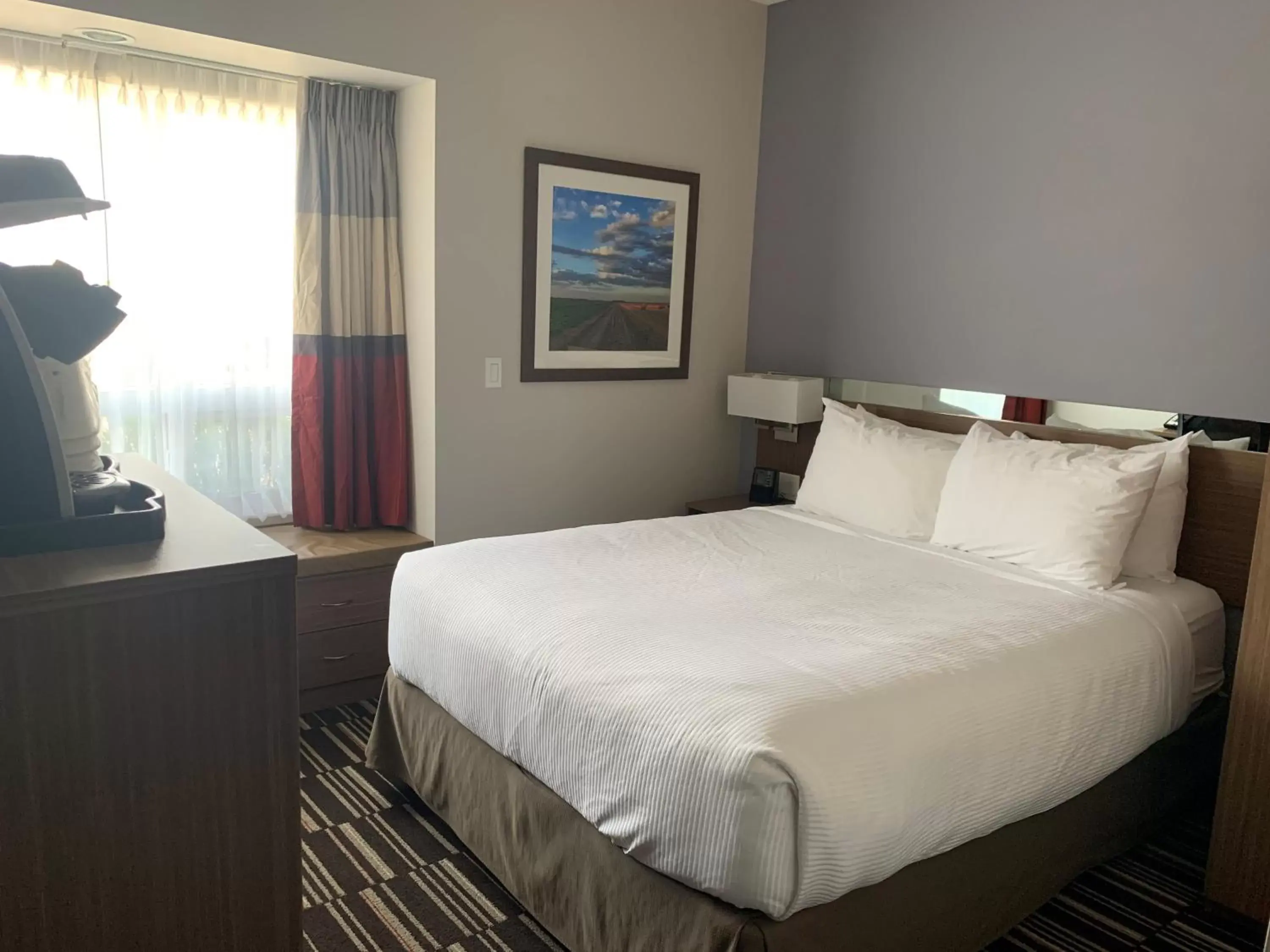 Bed in Microtel Inn & Suites by Wyndham Fort Saint John