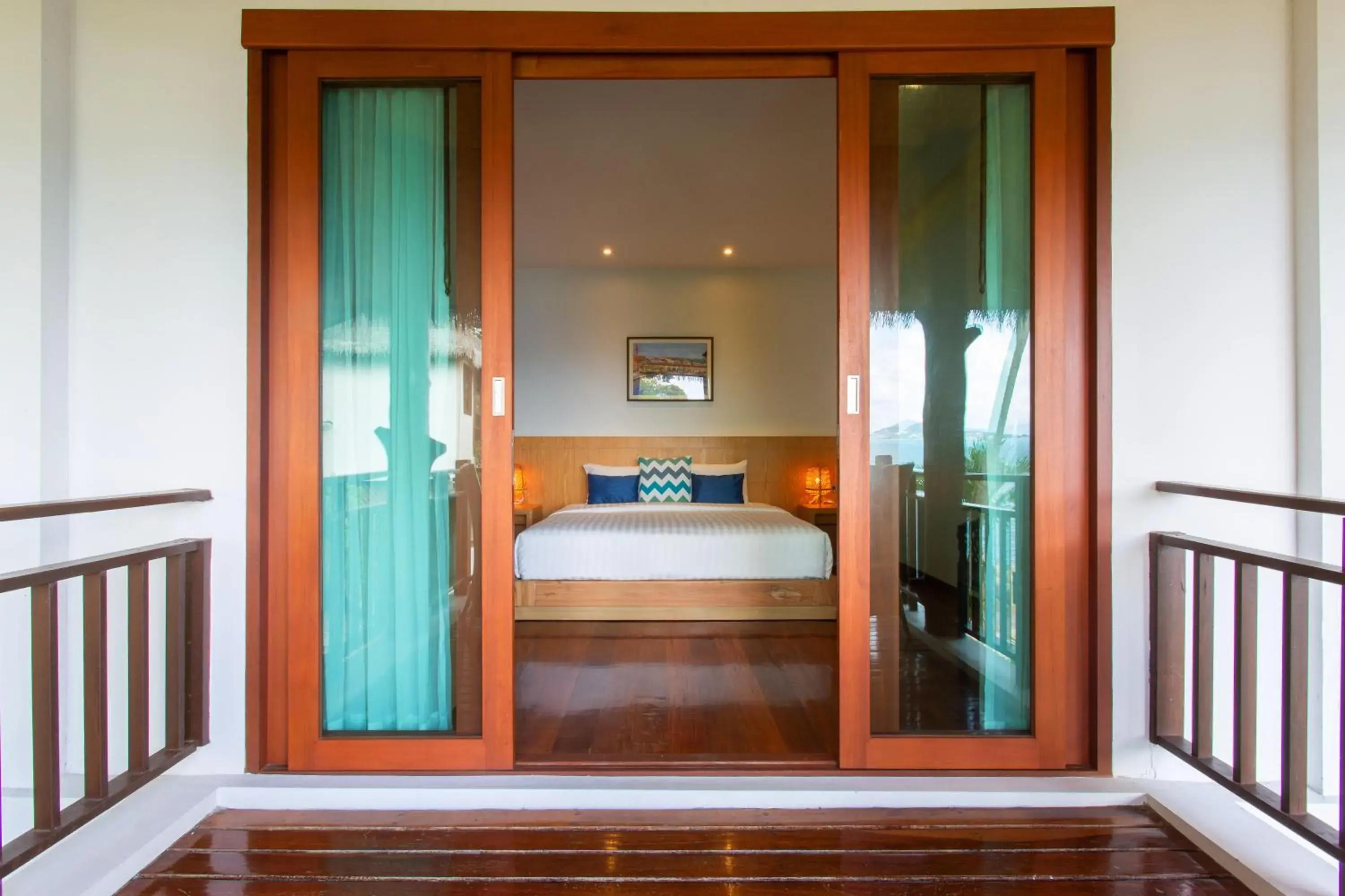 Bed in Coral Cliff Beach Resort Samui - SHA Plus