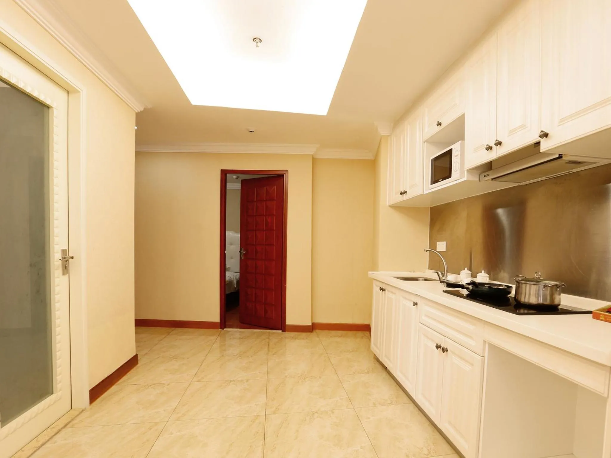 Kitchen or kitchenette in Guangzhou Pengman Apartment Zhengjia Huanshi Branch