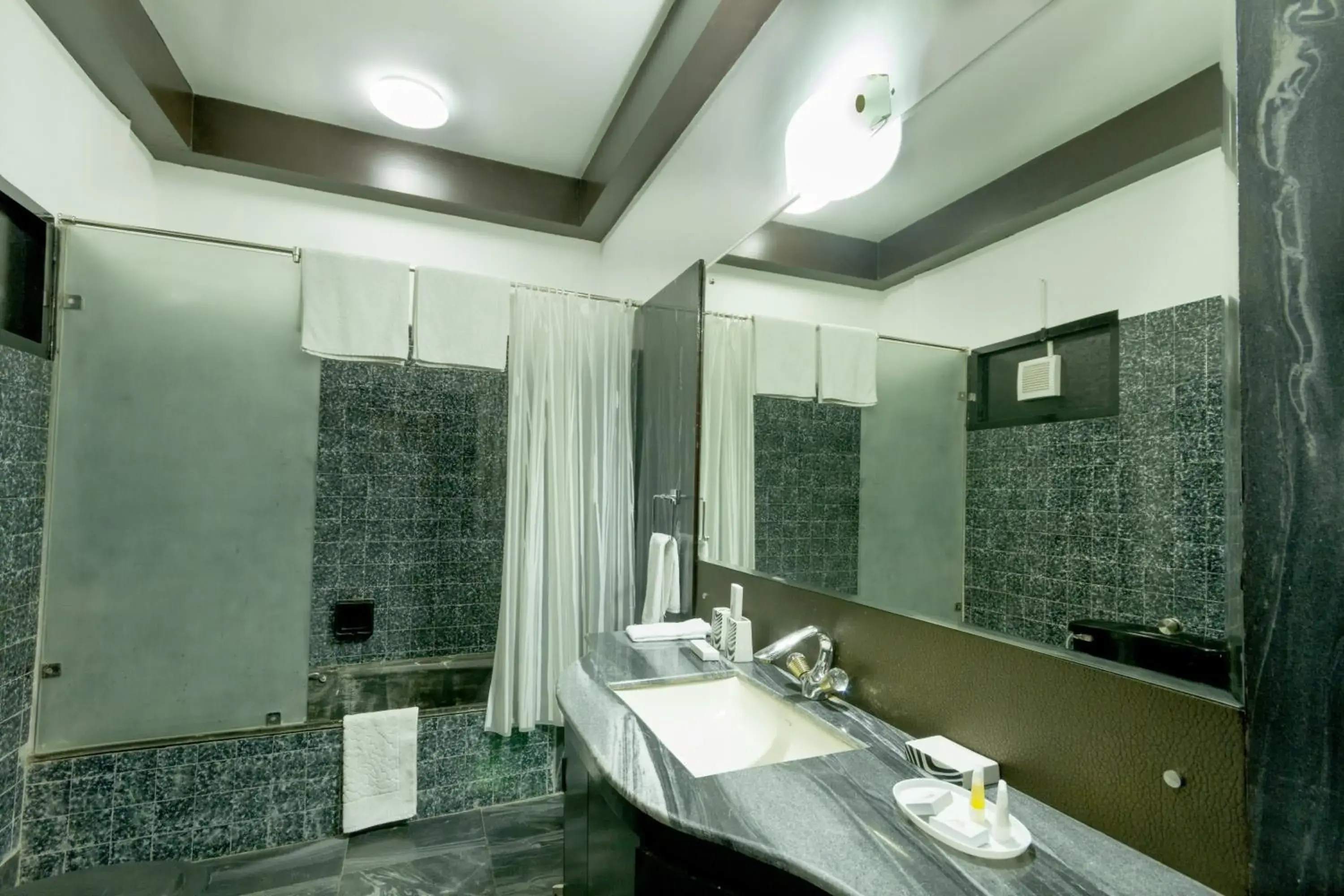 Bathroom in 66 Residency - A Boutique Hotel