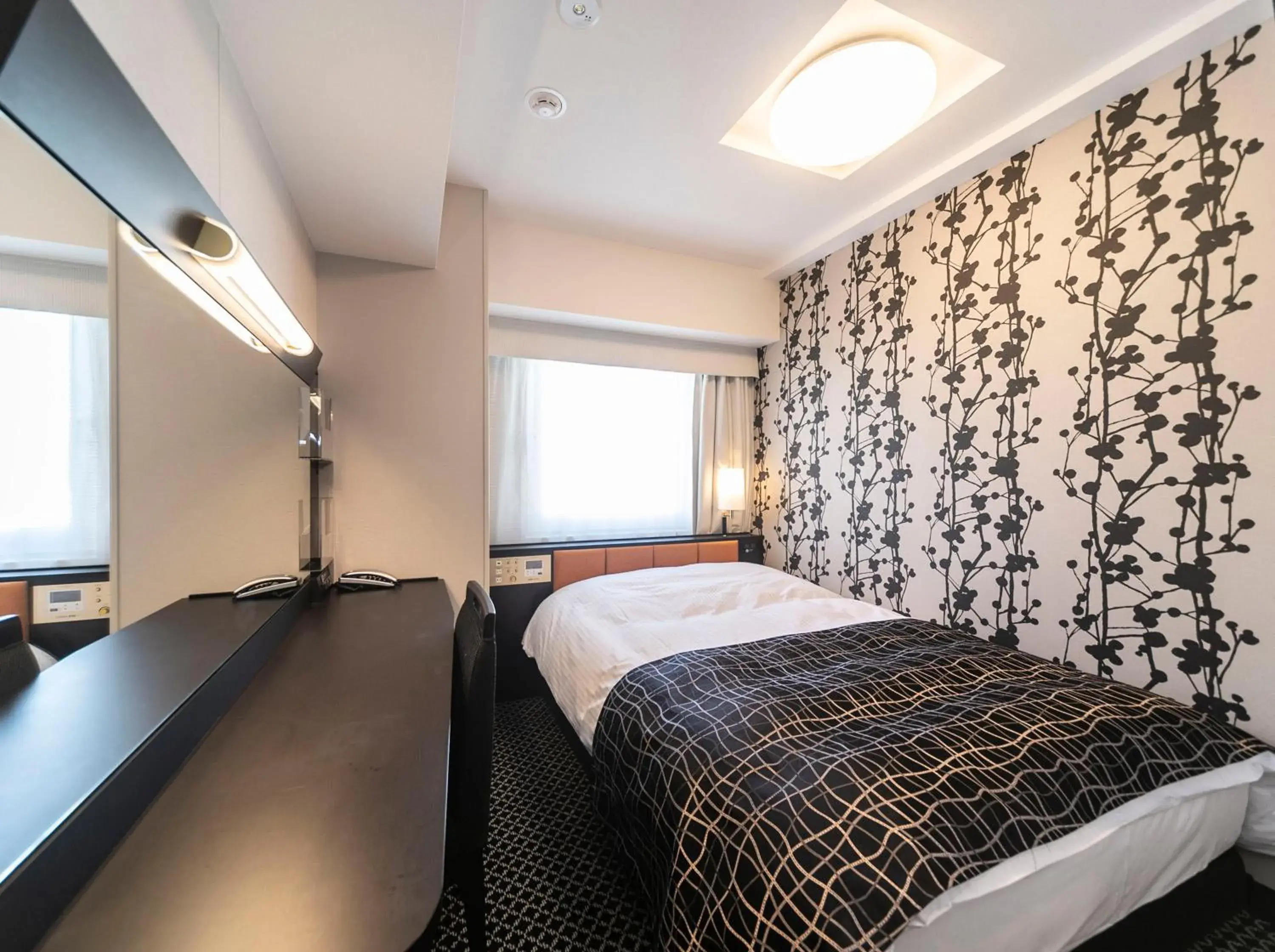 Photo of the whole room, Bed in APA Hotel Shin Osaka Ekiminami Photo of the whole room, Bed in APA Hotel Shin Osaka Ekiminami