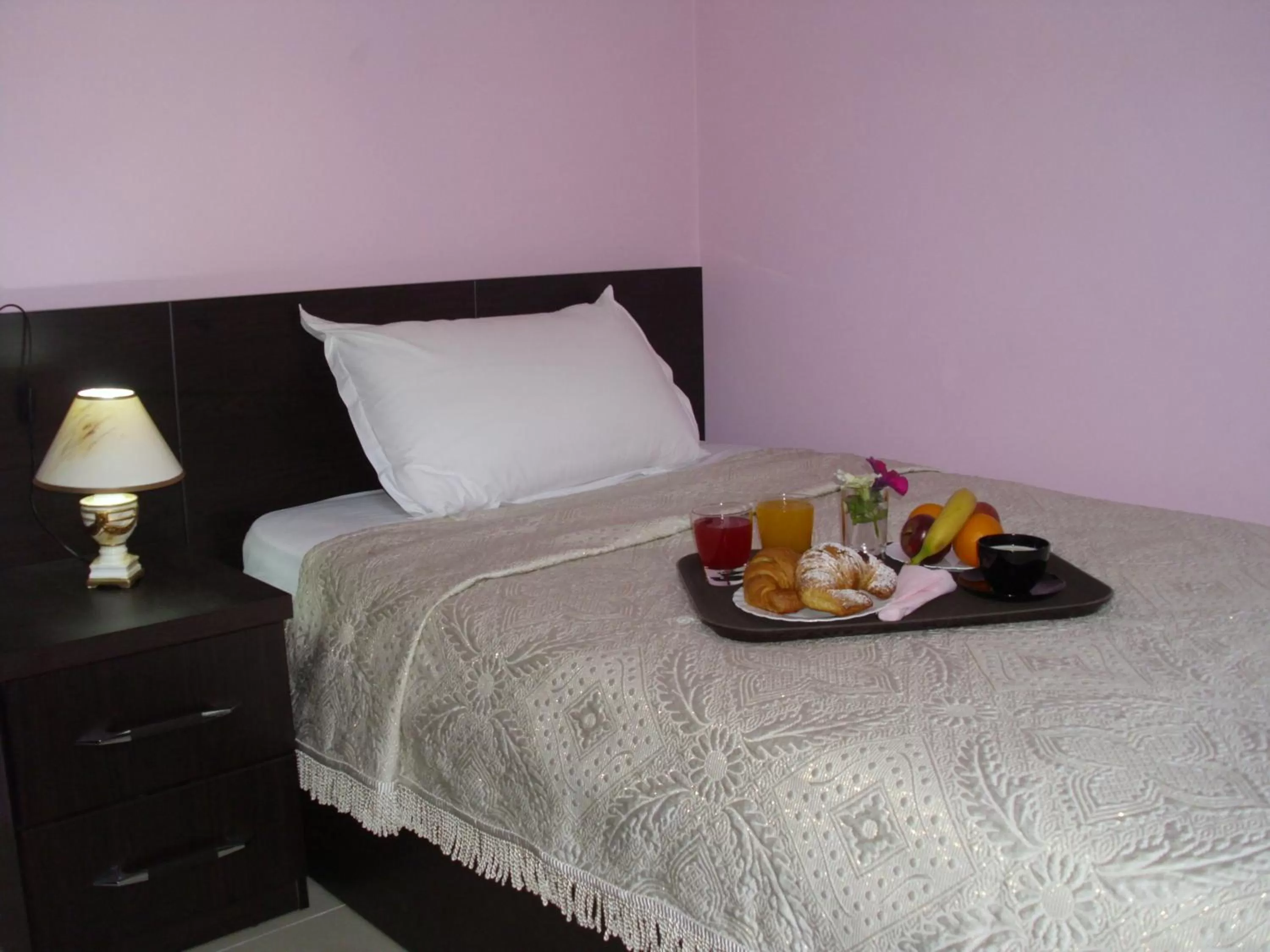 Decorative detail, Bed in Jolly City Center Hotel