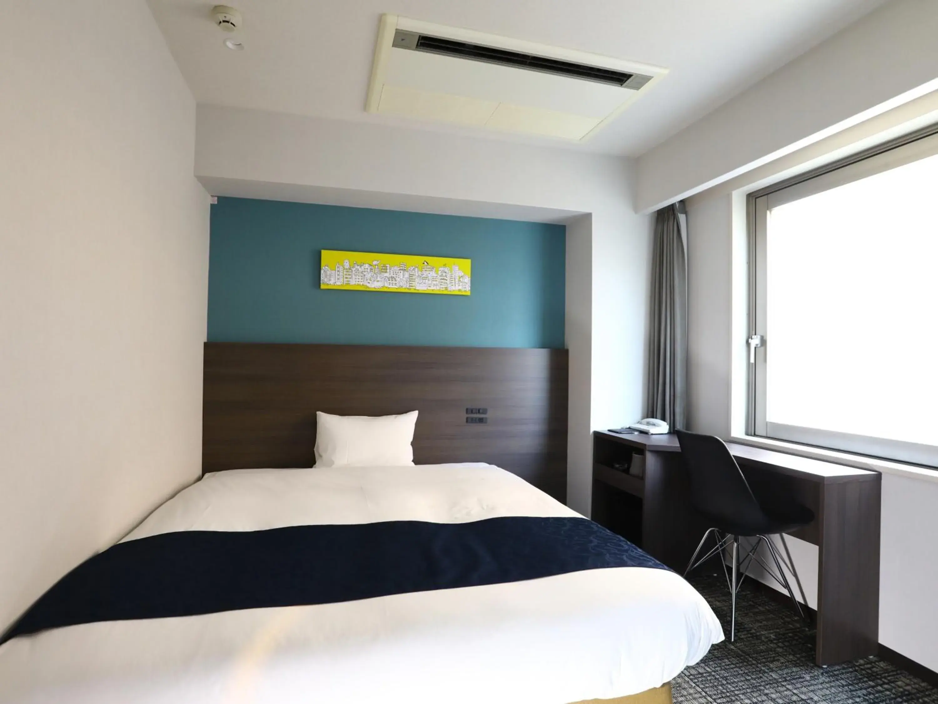 Bed in Hotel Wing International Ikebukuro