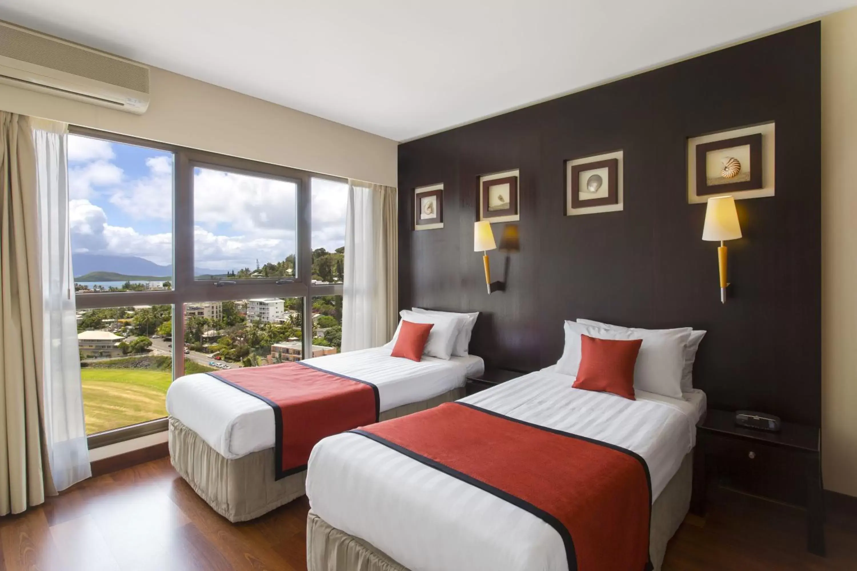 Bed in Ramada Hotel & Suites by Wyndham Noumea