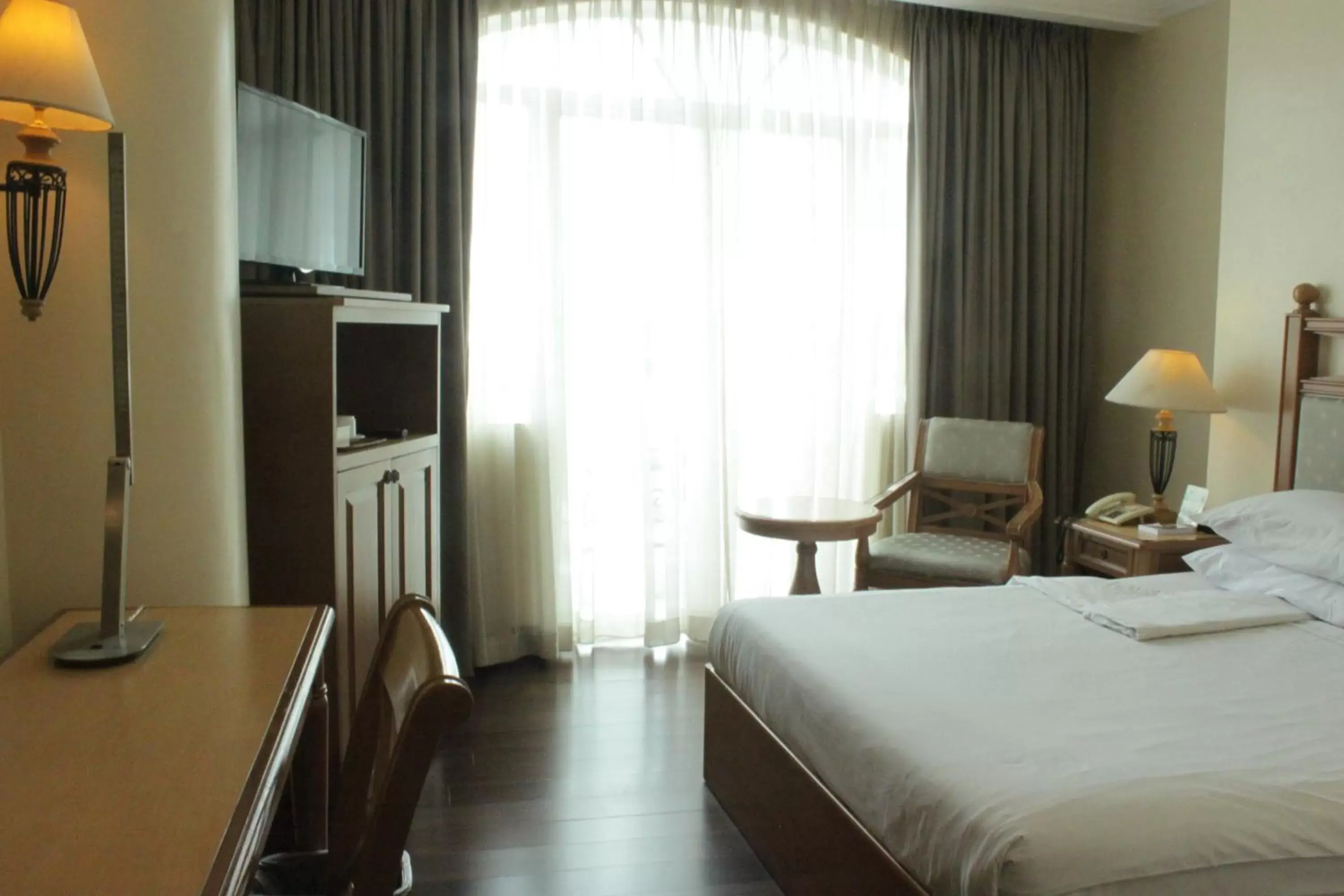 Bed in The Grand Dame Hotel Bed in The Grand Dame Hotel