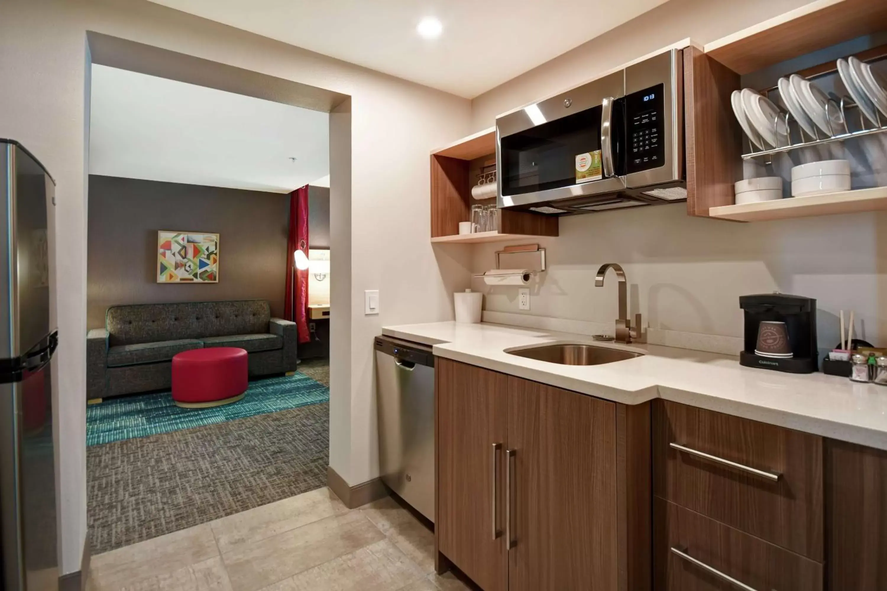 Living room, Kitchen/Kitchenette in Home2 Suites By Hilton Atlanta Marietta, Ga