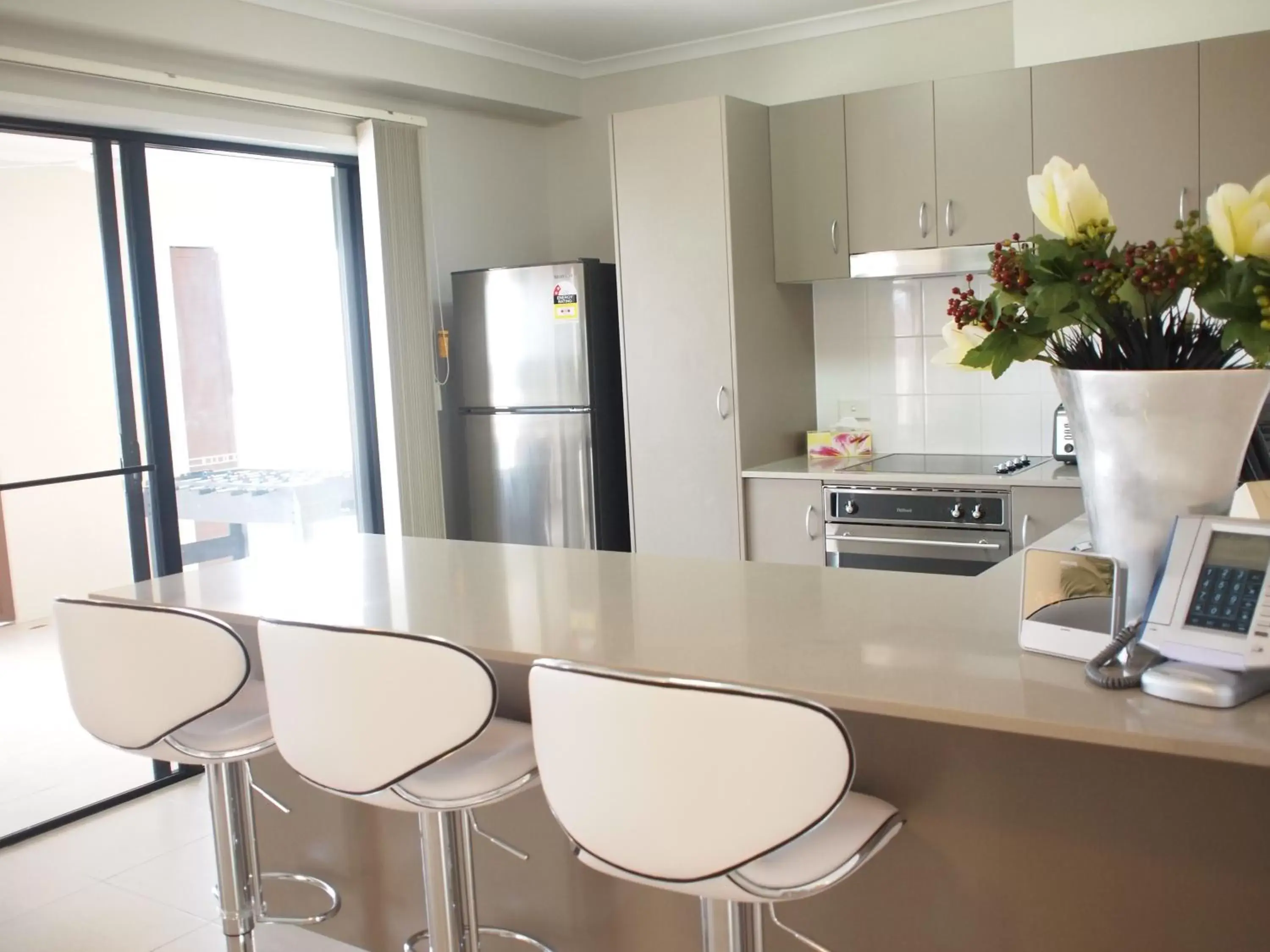 Living room, Bathroom in Edge Apartments Cairns